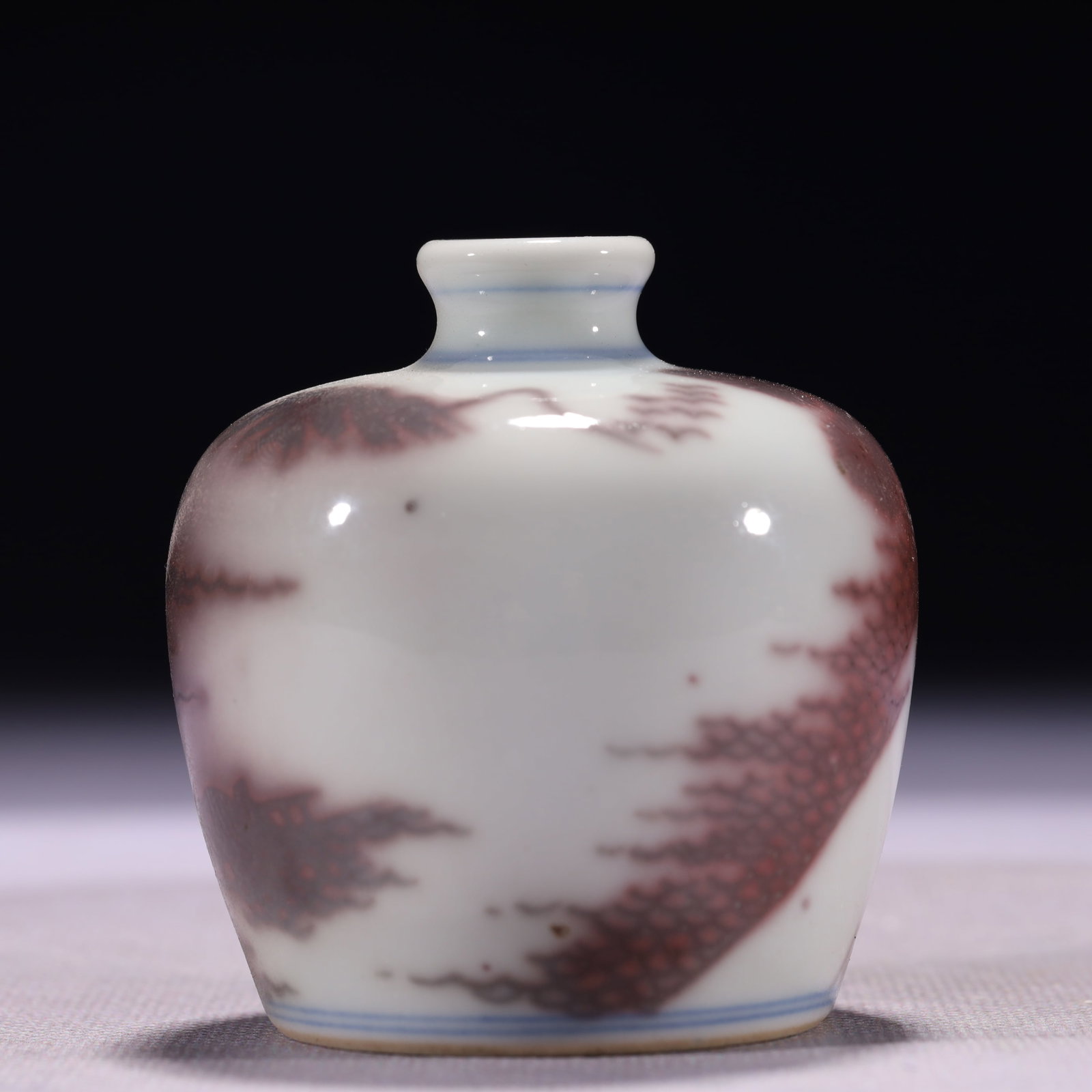 An Exquisite Underglaze-Red Landscape Pattern Snuff Bottle: An Exquisite Underglaze-Red Landscape Pattern Snuff Bottle,Qing Dynasty,China,Kangxi Six-character Mark,Size:2.2inx2.6in,Weight:135g