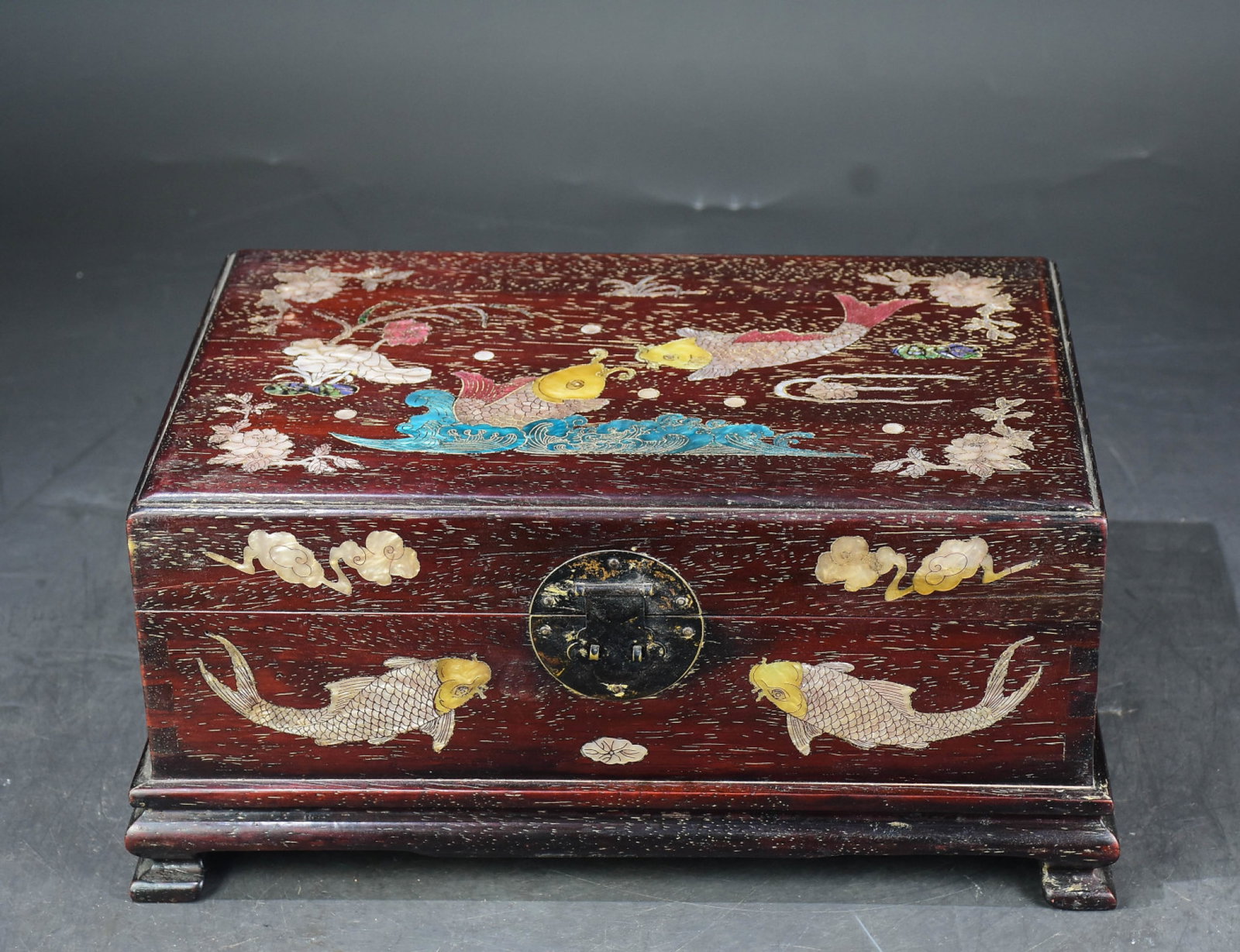 A Rare Zitanwood Inlaid Shell Flower and Fish Pattern Box: A Rare Zitanwood Inlaid Shell Flower and Fish Pattern Box,Qing Dynasty,China,Size:6.3inx13.8inx9.1in 紫檀木镶贝壳花卉鱼纹箱,中&#