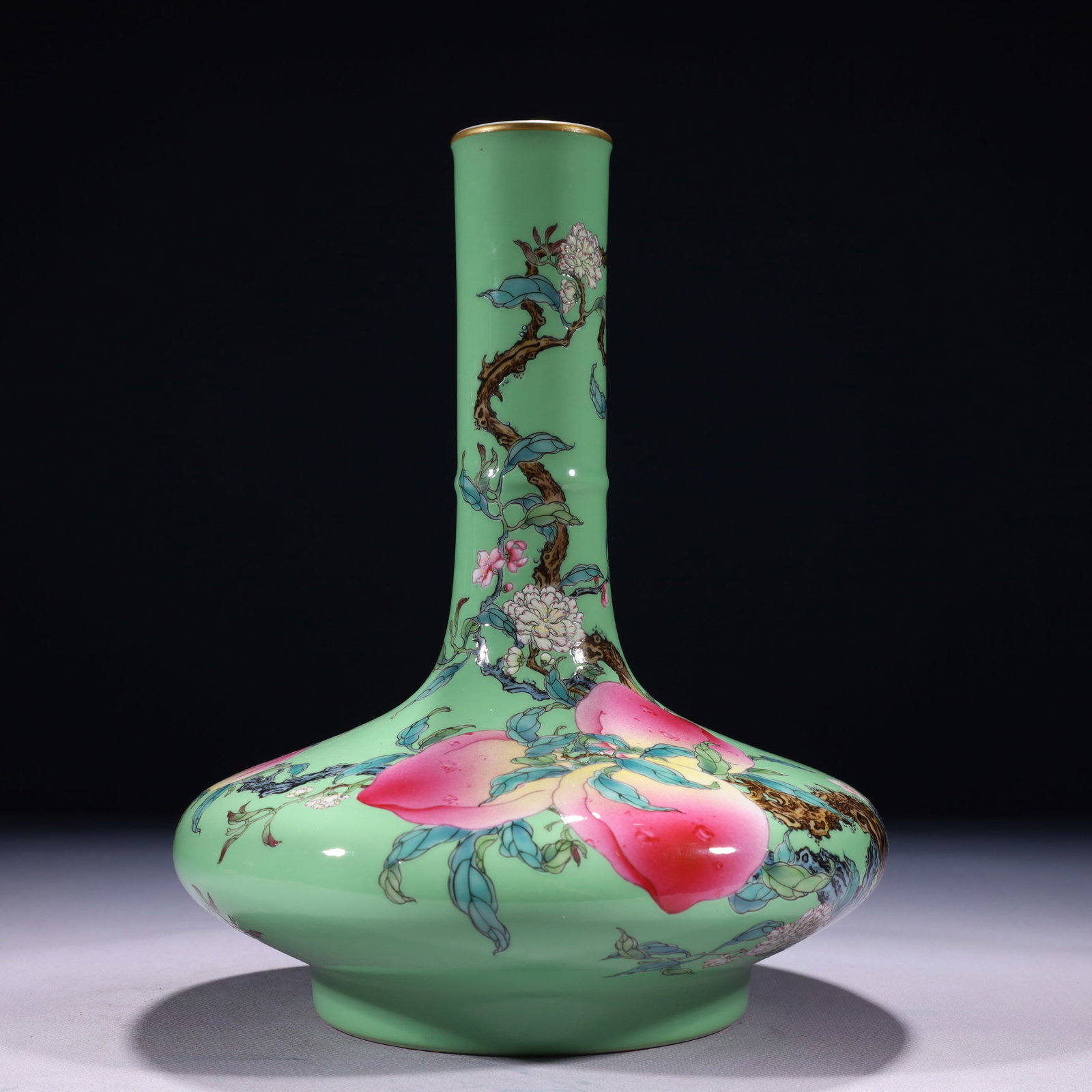An Exquisite Green Ground Famille-Rose Painted Gold Bats and Peach Pattern Vase: An Exquisite Green Ground Famille-Rose Painted Gold Bats and Peach Pattern Vase,Qing Dynasty,China,Yongzheng Six-character Mark,Size:8.3inx11.4in,Weight:2650g