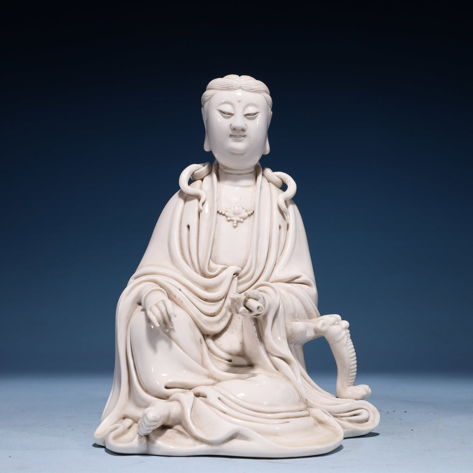 A Solemn Blance-De-Chine Statue of Avalokitesvara (1 of 9)