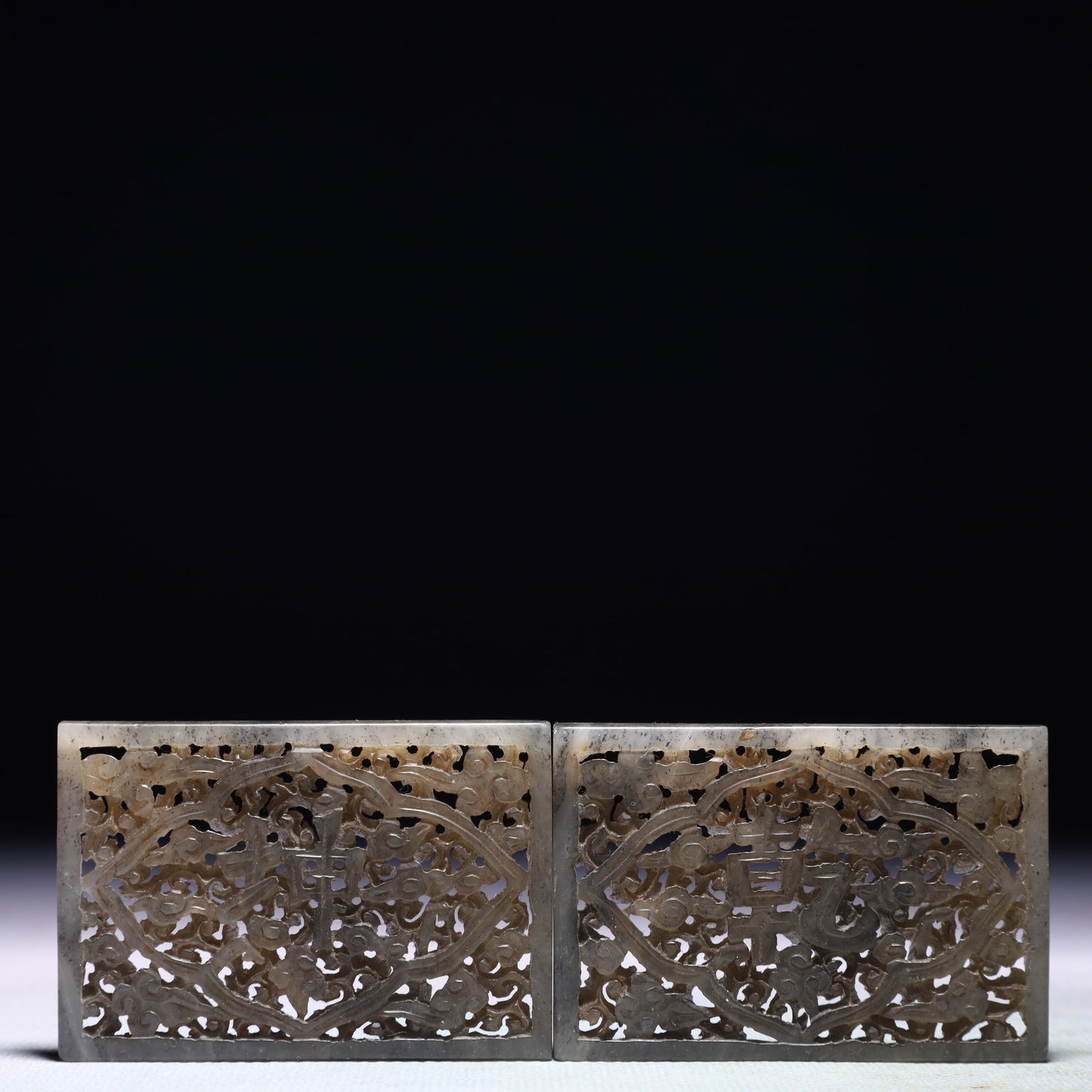A Pair of Exquisite White Jade Auspicious Cloud Pattern Pendants: A Pair of Exquisite White Jade Auspicious Cloud Pattern Pendants,Qing Dynasty,China,Size:2.6inx1.8in,Weight:110g