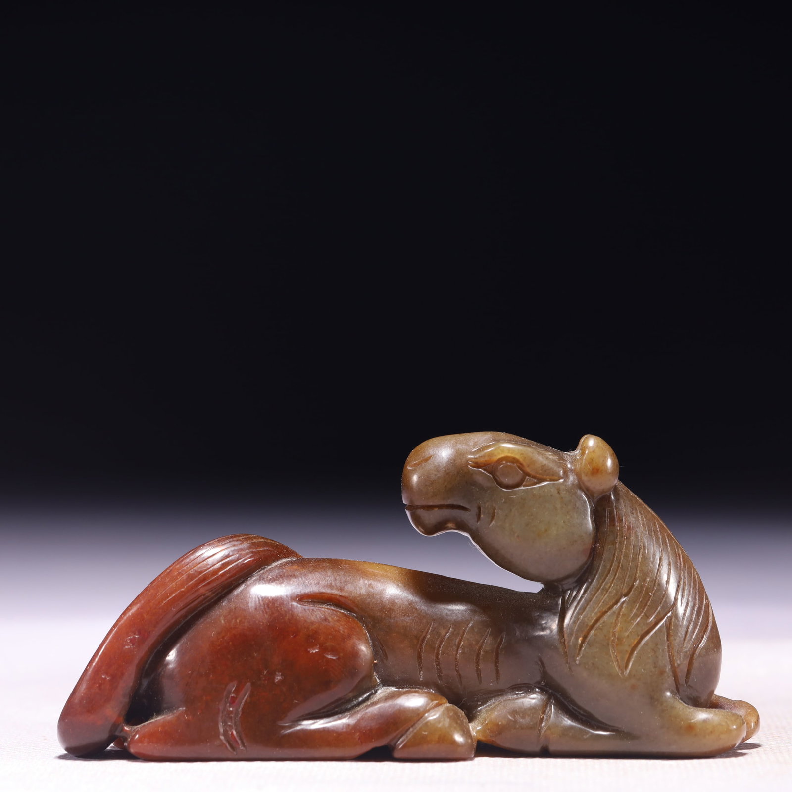An Exquisite Archaic Jade Horse Ornament: An Exquisite Archaic Jade Horse Ornament,Ancient Time,China,Size:3.9inx1.4inx1.8in,Weight:175g 高古玉骏马摆件,中国远古时期