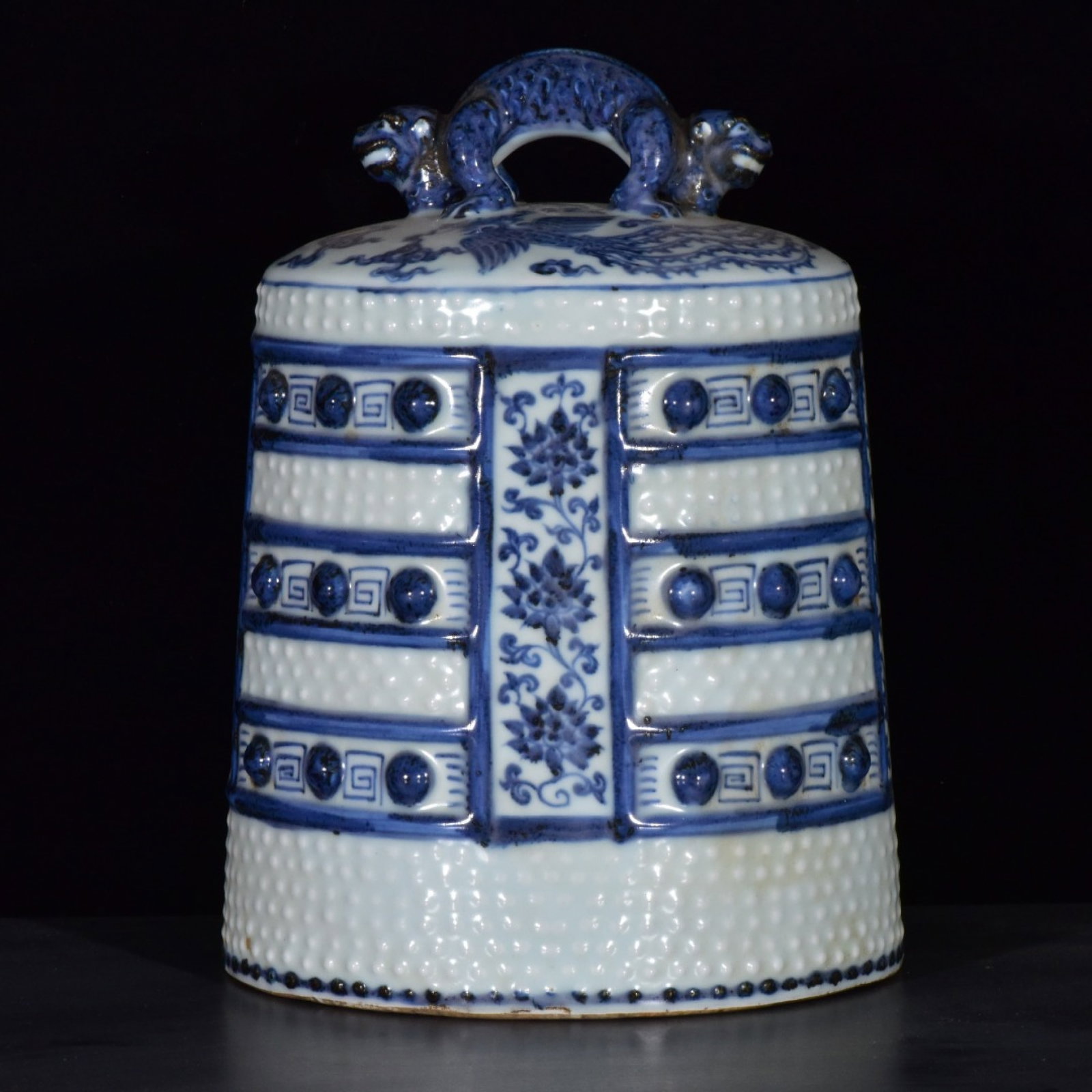 An Exquisite Blue and White Auspicious Cloud and Phoenix Pattern Chime: An Exquisite Blue and White Auspicious Cloud and Phoenix Pattern Chime,Ming Dynasty,China,Xuande Four-character Mark,Size:9.8inx7.1inx6.1in