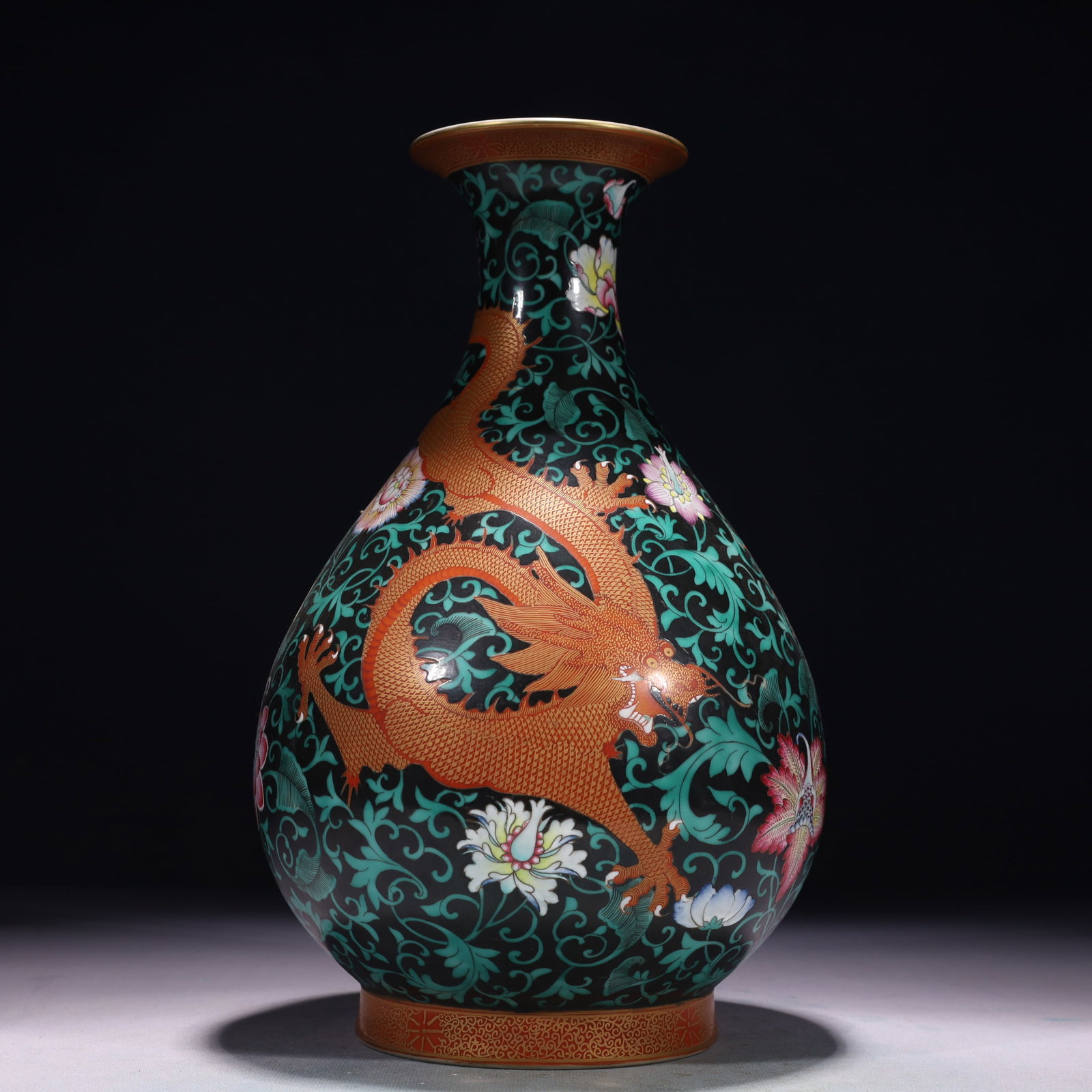 An Exquisite Famille-Rose Painted Gold Lotus and Dragon Pattern Vase: An Exquisite Famille-Rose Painted Gold Lotus and Dragon Pattern Vase,Qing Dynasty,China,Yongzheng Six-character Mark,Size:7.1inx12.2in,Weight:2000g ??????????,????,?????