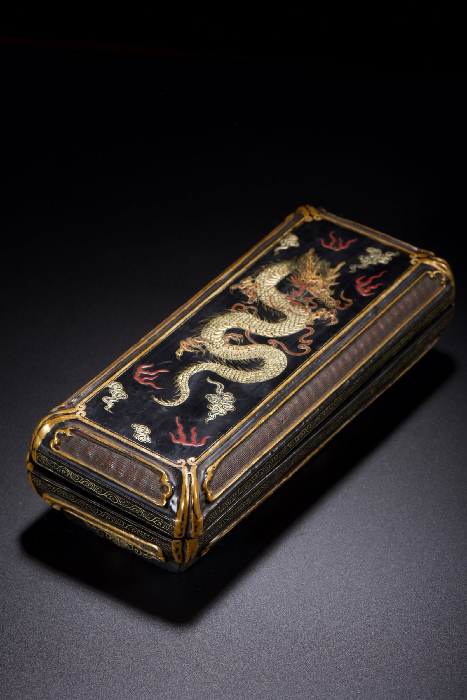 An Exquisite Carved Lacquer Painted Gold Auspicious Cloud and Dragon Pattern Box with Cover: An Exquisite Carved Lacquer Painted Gold Auspicious Cloud and Dragon Pattern Box with Cover,Qing Dynasty,China,With Mark,Size:2.8inx3.9inx9.1in,Weight:380g 漆器描金祥