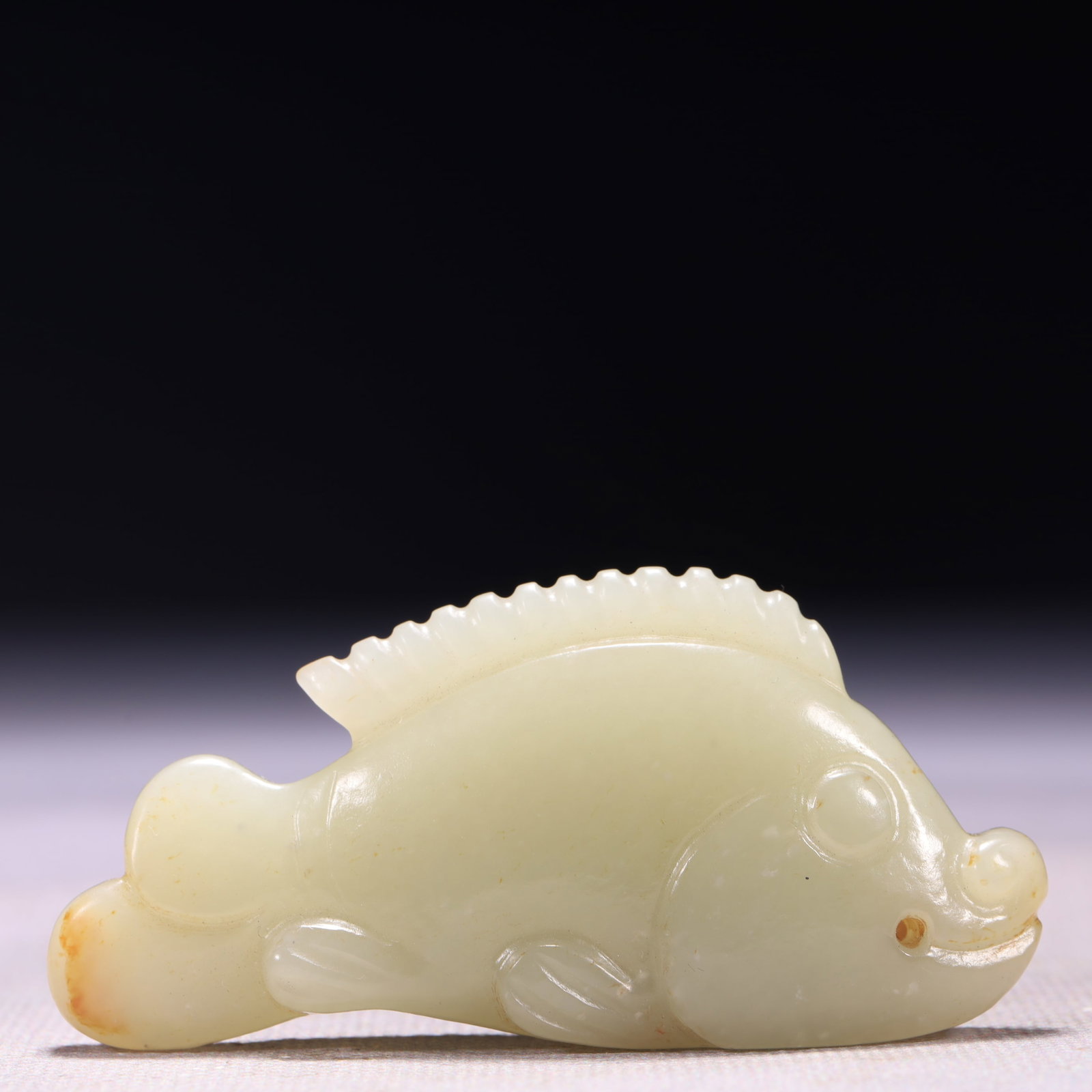 An Exquisite White Jade Fish Ornament: An Exquisite White Jade Fish Ornament,Qing Dynasty,China,Size:3inx0.6inx1.4in,Weight:63g 白玉鱼摆件,中国清代