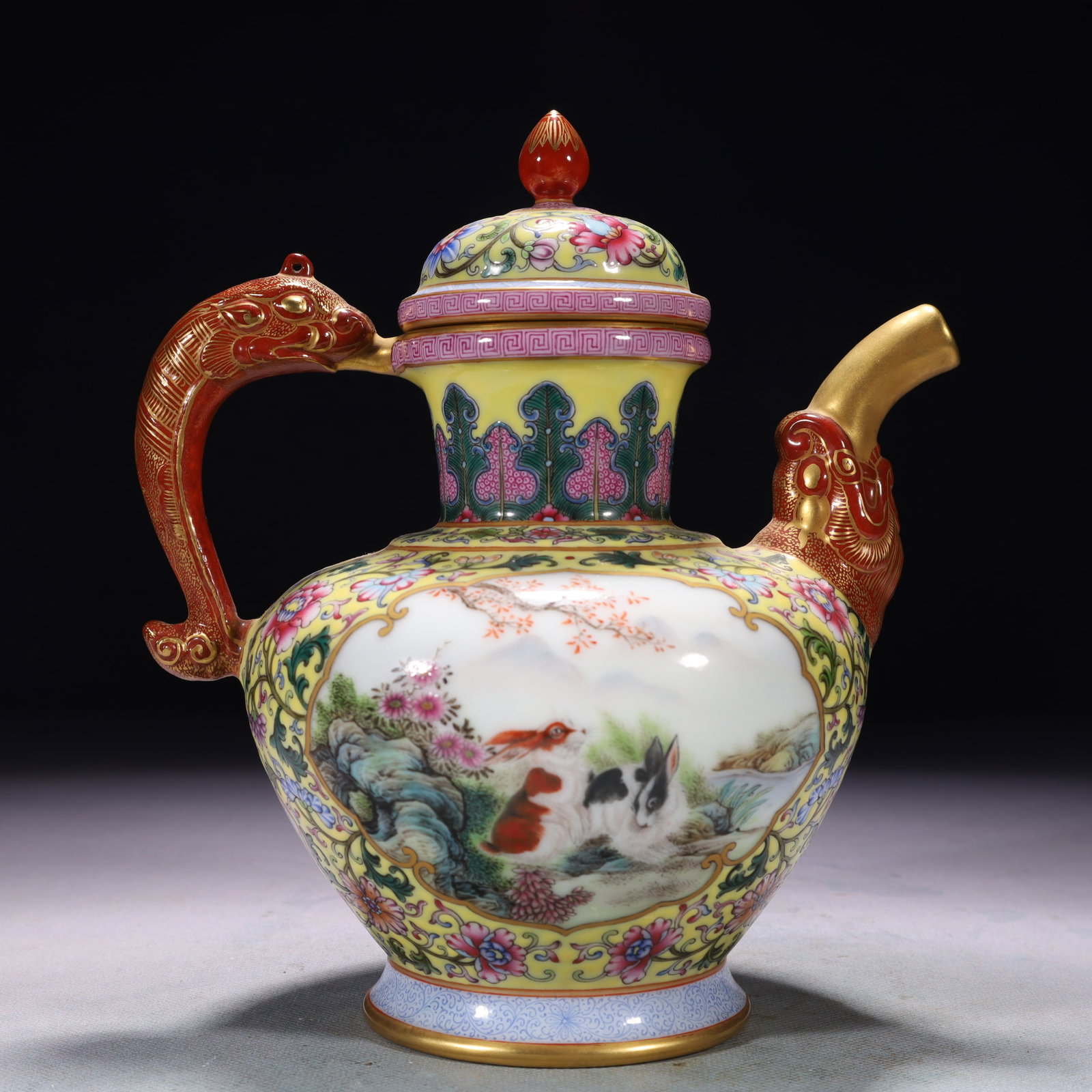 An Exquisite Yellow Ground Enamel Painted Gold Flower Pattern Ewer: An Exquisite Yellow Ground Enamel Painted Gold Flower Pattern Ewer,Qing Dynasty,China,Qianlong Four-character Mark,Size:7.1inx5.1inx8.1in,Weight:1000g