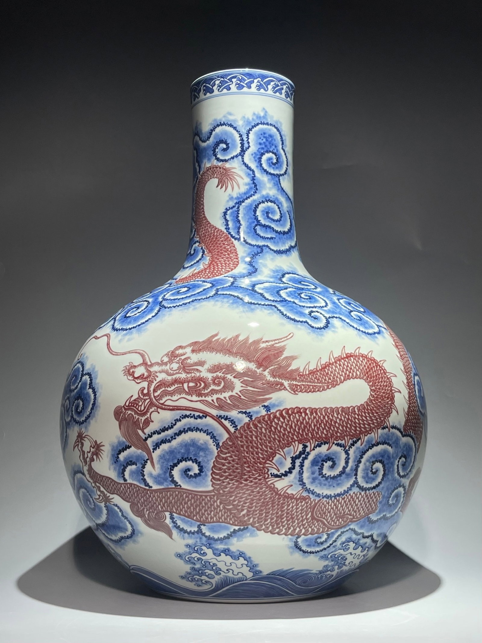 A Huge Blue and White Underglaze-Red Auspicious Cloud and Dragon Pattern Vase: A Huge Blue and White Underglaze-Red Auspicious Cloud and Dragon Pattern Vase,Qing Dynasty,China,Qianlong Six-character Mark,Size:21.6inx16.5in 青花釉里红祥云
