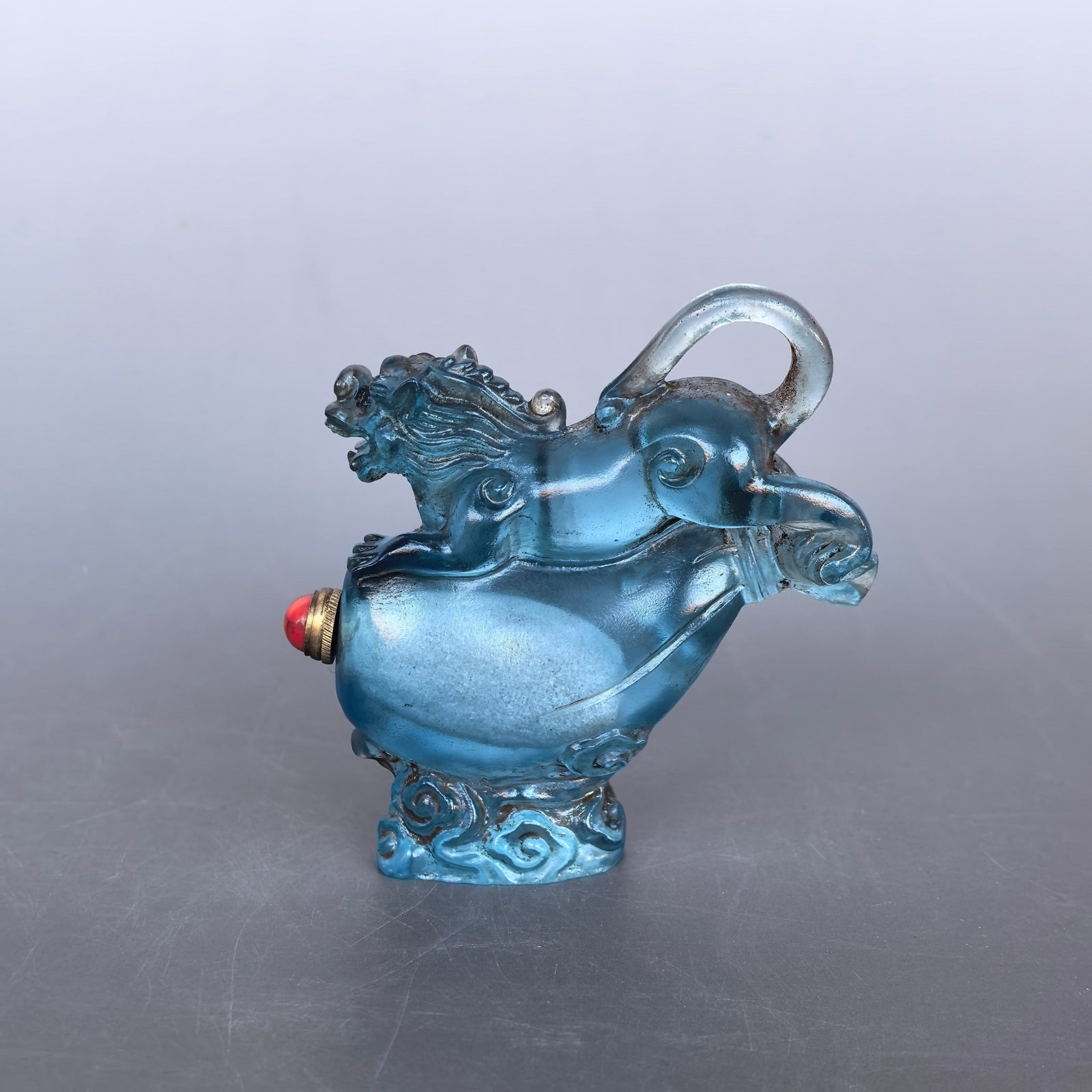 An Exquisite Glass Wealth-Attracting Creature Snuff Bottle: An Exquisite Glass Wealth-Attracting Creature Snuff Bottle,Qing Dynasty,China,Size:3.1inx1.2inx3.5in,Weight:138g
