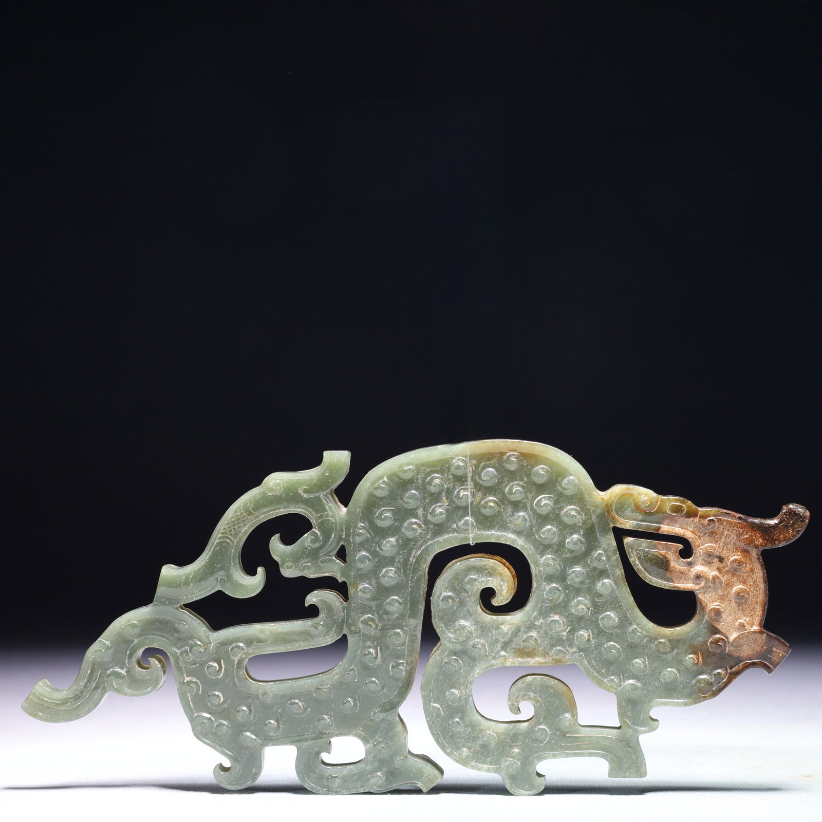 An Exquisite Green Jade Dragon Ornament: An Exquisite Green Jade Dragon Ornament,Qing Dynasty,China,Size:7.1inx3.1in,Weight:135.1g 青玉龙摆件,中国清代