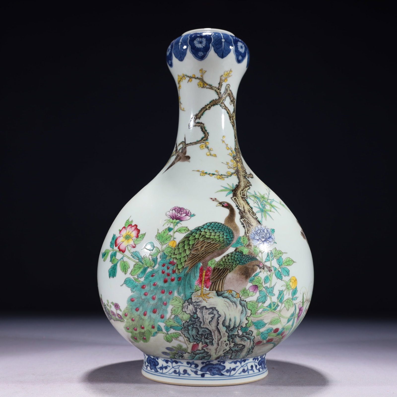 An Exquisite Blue and White Famille-Rose Flower and Peacock Pattern Vase,with poem: An Exquisite Blue and White Famille-Rose Flower and Peacock Pattern Vase,with poem,Qing Dynasty,China,Qianlong Six-character Mark,Size:7.1inx12.2in,Weight:1800g 青花粉彩花
