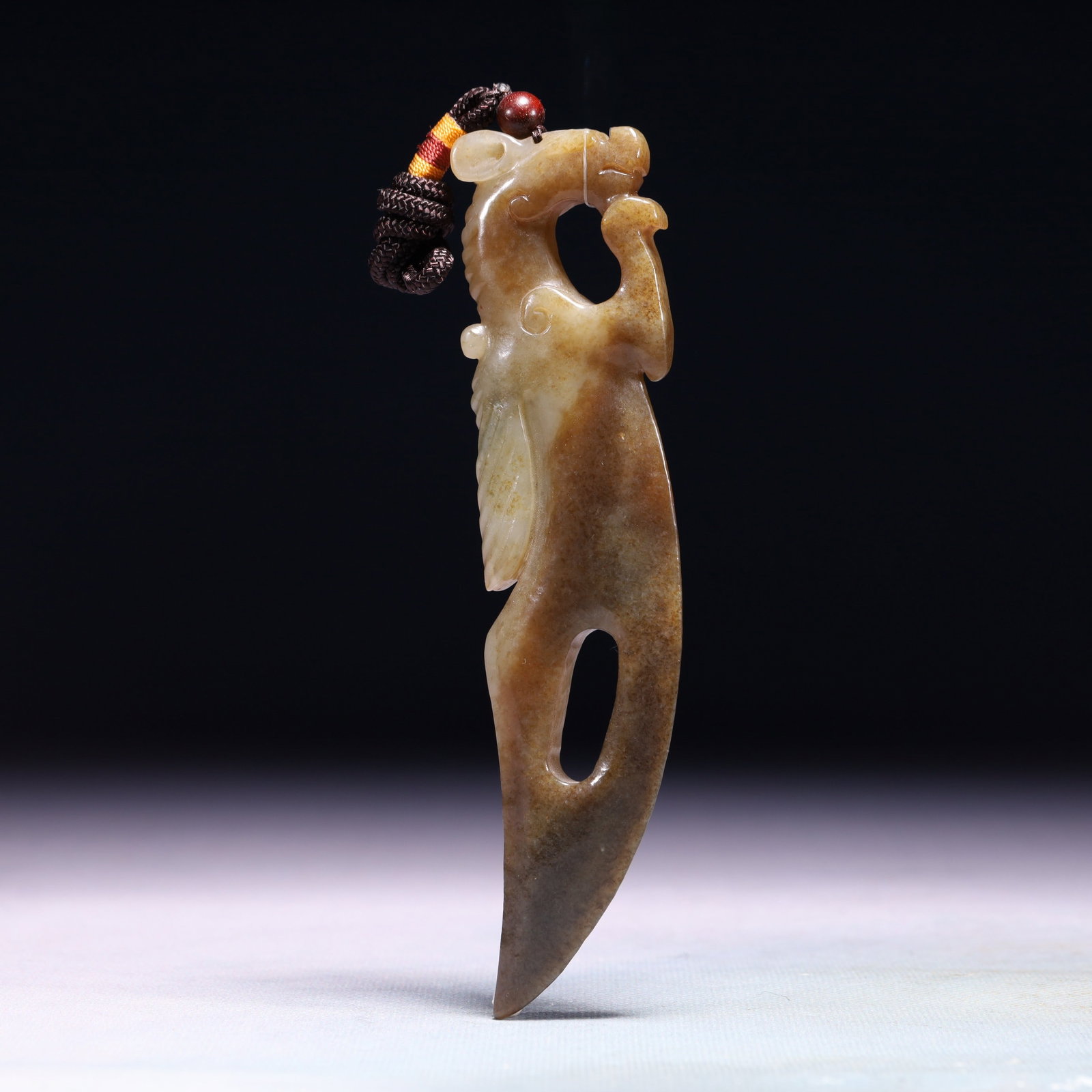 An Exquisite White Jade Beast Pendant: An Exquisite White Jade Beast Pendant,Qing Dynasty,China,Size:5.9inx1.2in,Weight:94.5g 白玉兽挂件,中国清代