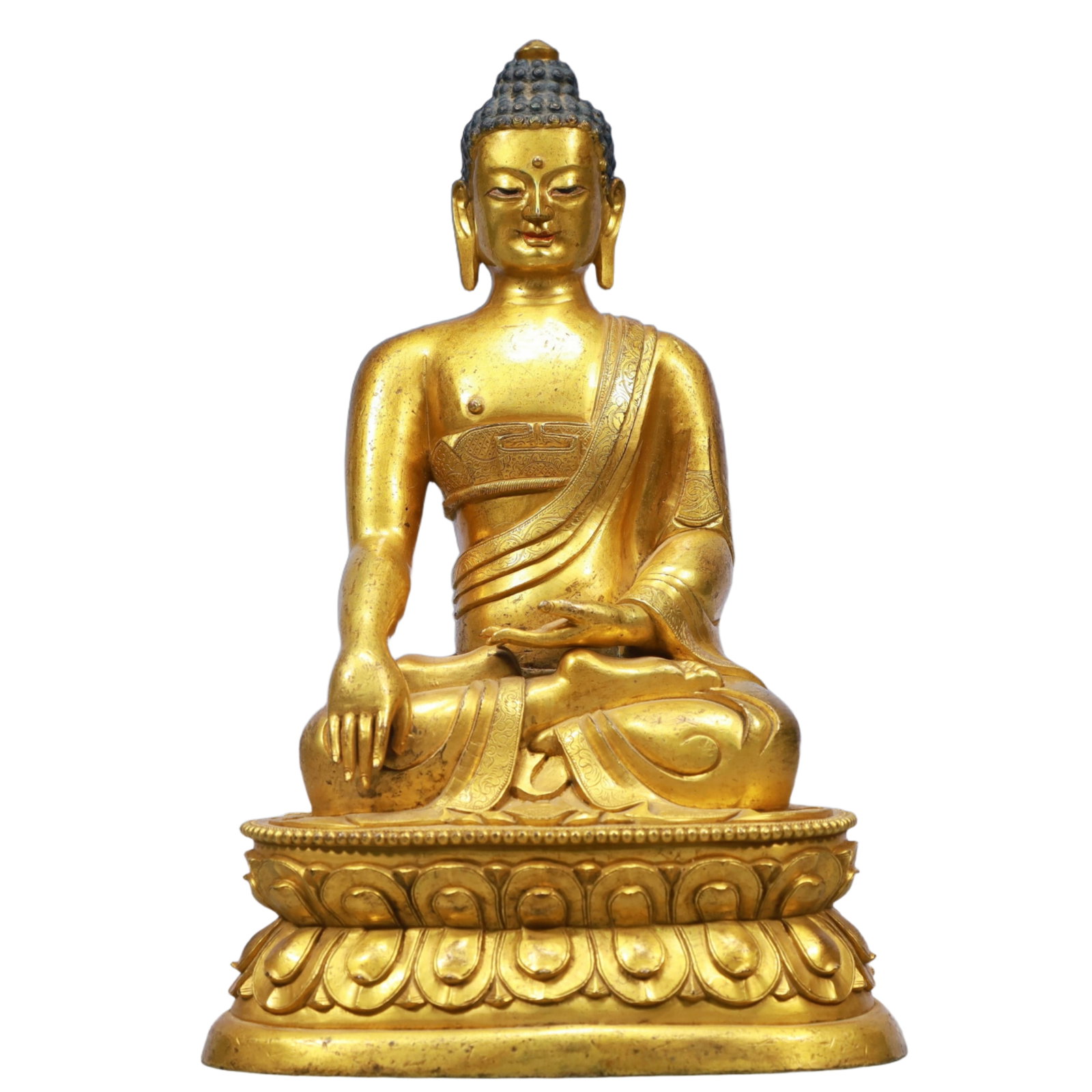 A Solemn Gilt Bronze Statue of Sakyamuni: A Solemn Gilt Bronze Statue of Sakyamuni,Qing Dynasty, China,Size:6.3inx4.3inx10.2in,Weight:3400g 铜鎏金释迦摩尼像,中国清代
