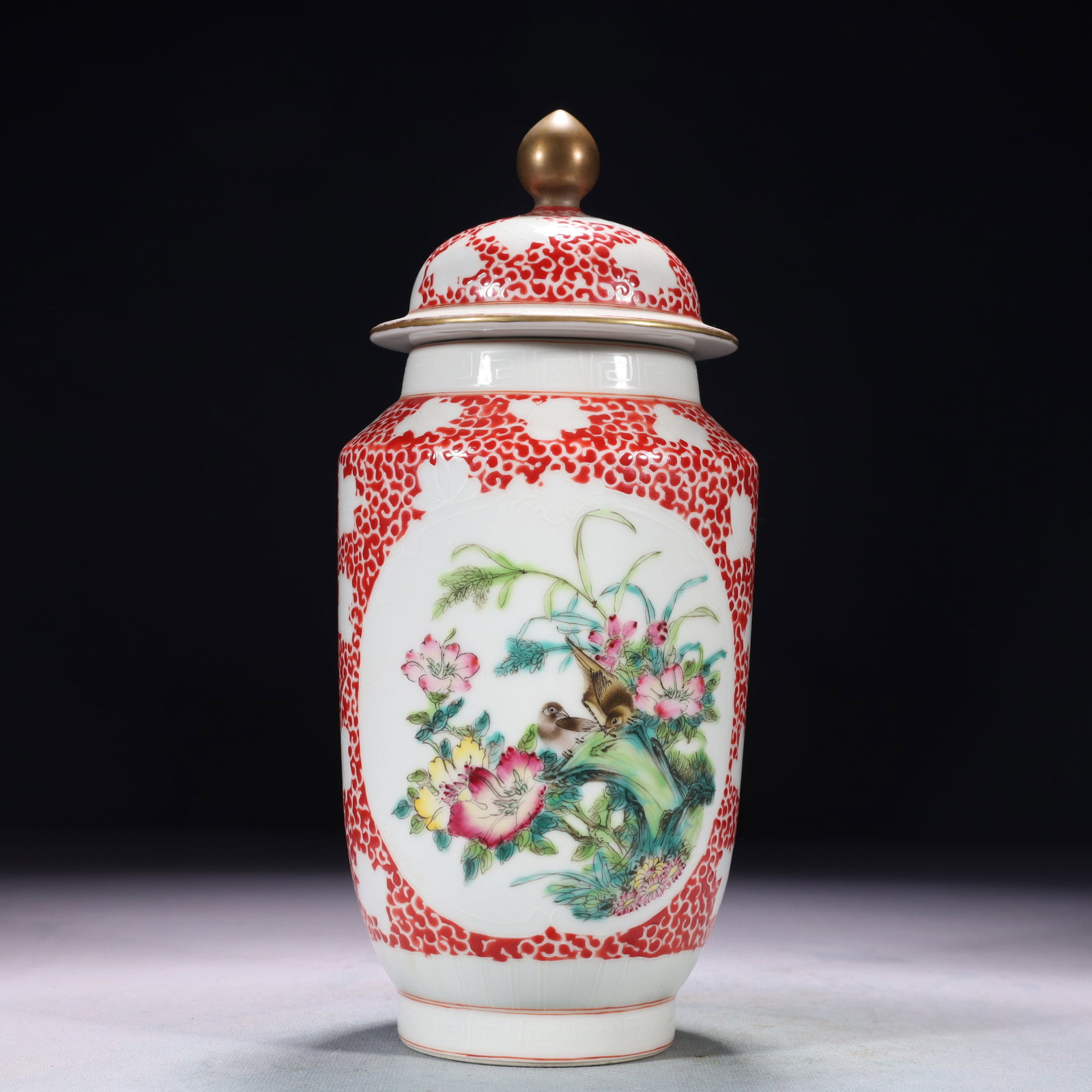 An Exquisite Famille-Rose Flower and Bird Pattern Jar with Cover: An Exquisite Famille-Rose Flower and Bird Pattern Jar with Cover,Qing Dynasty,China,Qianlong Six-character Mark,Size:4.3inx9.8in,Weight:900g