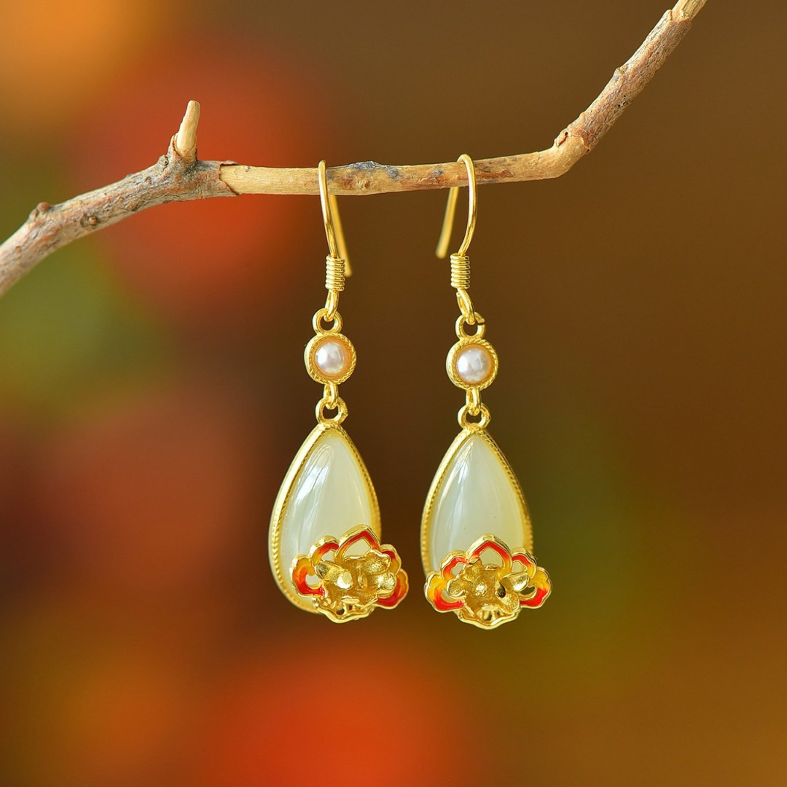A Pair of Exquisite Sterling Silver-Gold Plated Inlaid White Jade Earrings: A Pair of Exquisite Sterling Silver-Gold Plated Inlaid White Jade Earrings 一对纯银镀金镶白玉耳环