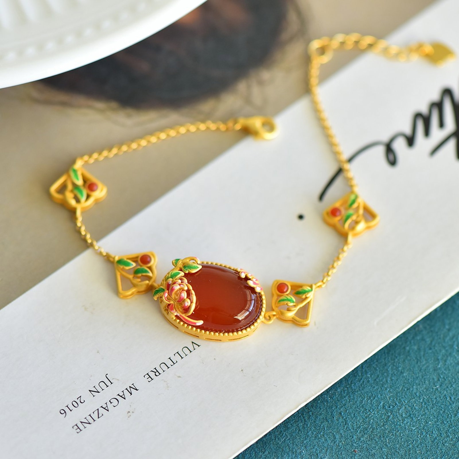 An Exquisite Sterling Silver-Gold Plated Inlaid Red Agate Bracelet: An Exquisite Sterling Silver-Gold Plated Inlaid Red Agate Bracelet,Size:0.5inx0.7in 纯银镀金镶红玛瑙手链