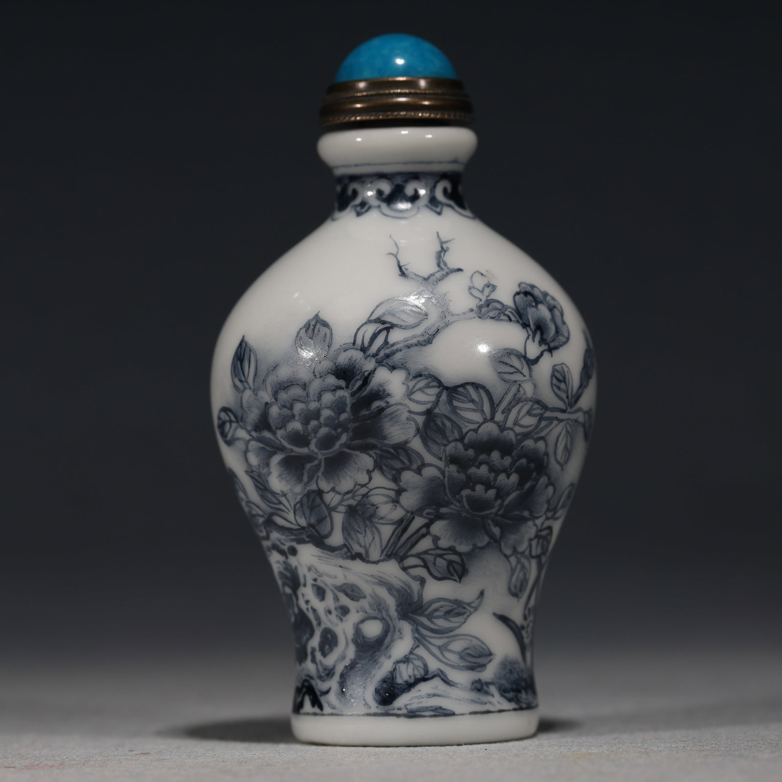 An Exquisite Blue and White Peony Lake Stone Pattern Snuff Bottle (1 of 6)