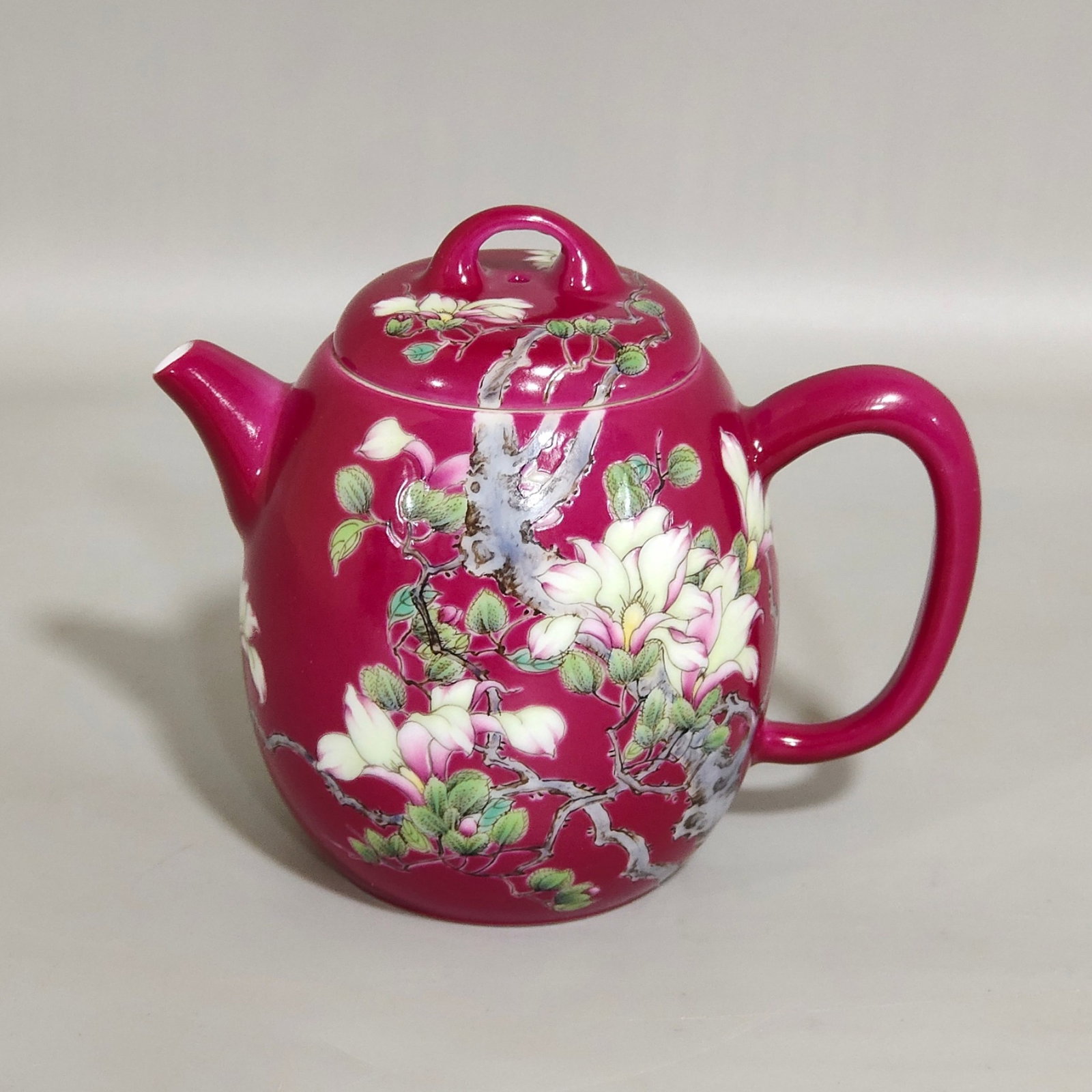 An Exquisite Ruby Red-Glazed Famille-Rose Flower Pattern Teapot: An Exquisite Ruby Red-Glazed Famille-Rose Flower Pattern Teapot,Qing Dynasty,China,Yongzheng Four-character Mark,Size:3.4inx3.9in