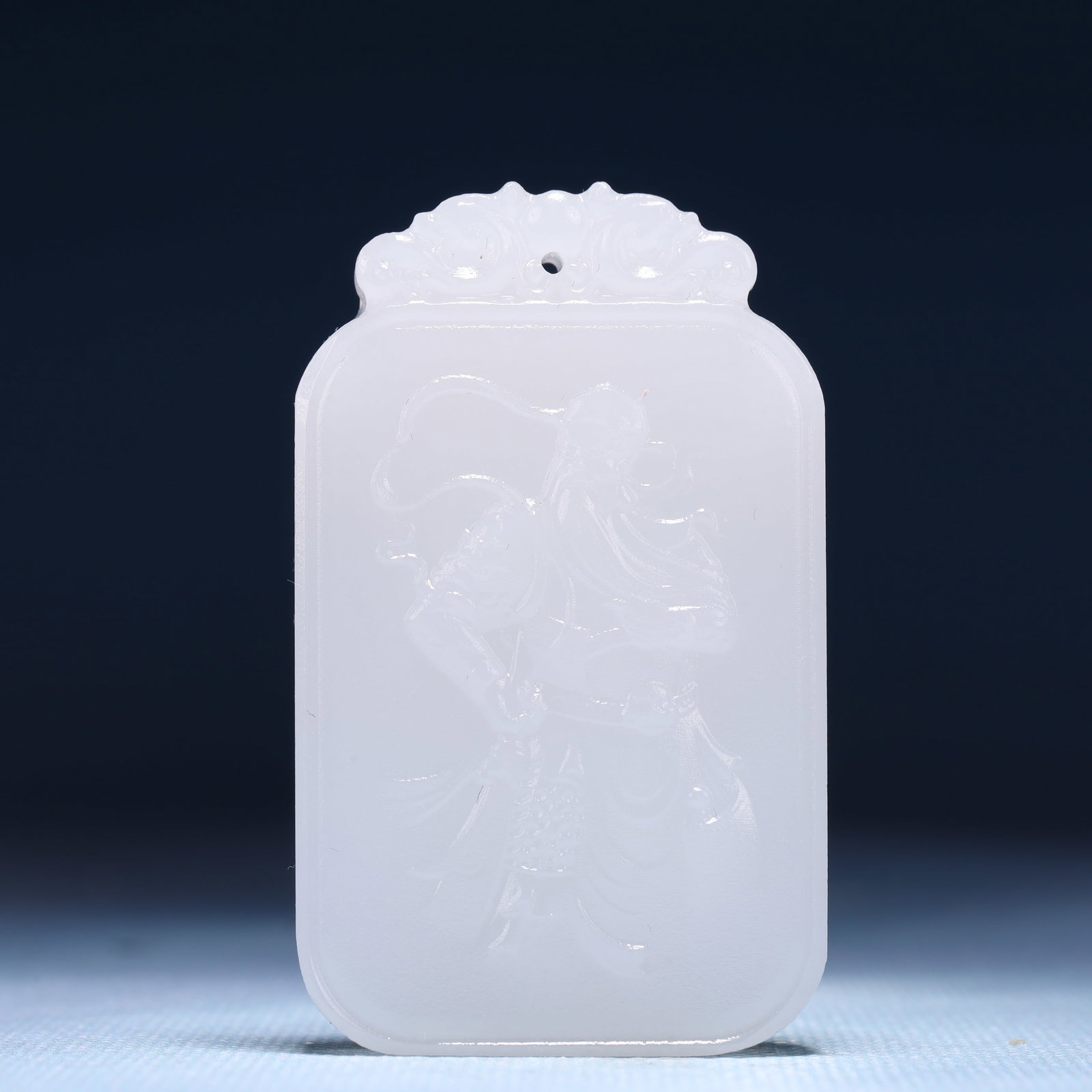An Exquisite White Jade Figure Pattern Pendant: An Exquisite White Jade Figure Pattern Pendant,Size:1.6inx0.4inx2.4in,Weight:49g 白玉人物纹牌
