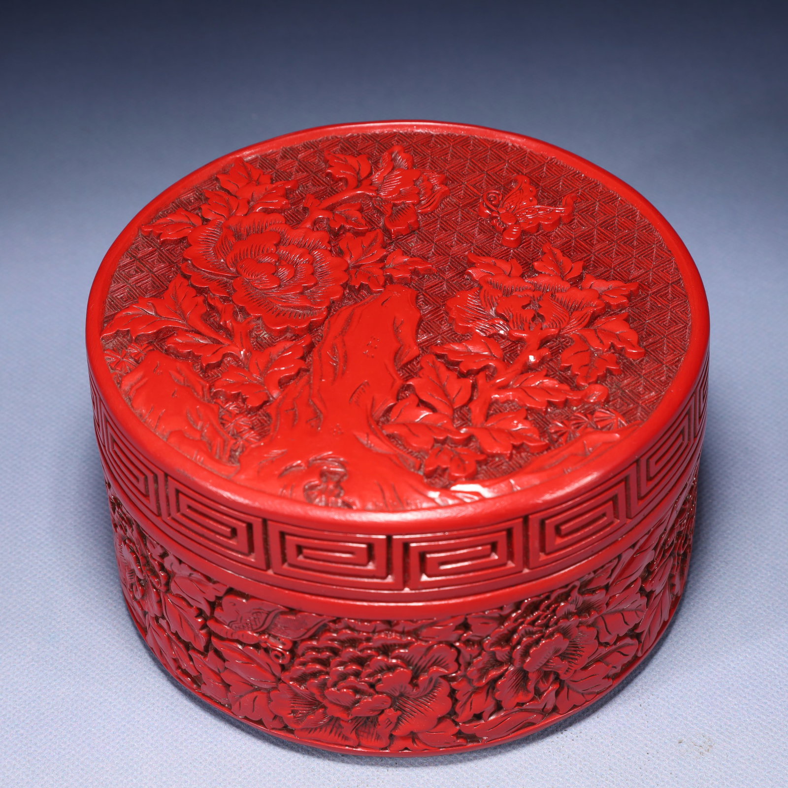 An Exquisite Carved Red Lacquer Flower and Butterfly Pattern Box with Cover: An Exquisite Carved Red Lacquer Flower and Butterfly Pattern Box with Cover,Qing Dynasty,China,Qianlong Four-character Mark,Size:5.5inx3.1in,Weight:700g