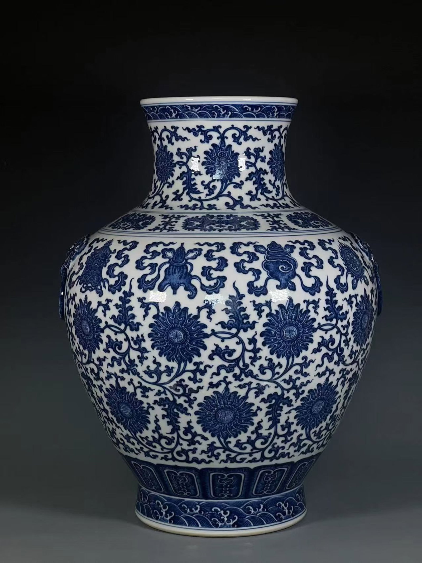 A Huge Blue and White Lotus and Eight Treasures Pattern Beast-Ears Vase: A Huge Blue and White Lotus and Eight Treasures Pattern Beast-Ears Vase,Qing Dynasty,China,Qianlong Six-character Mark,Size:20.6inx8.6in