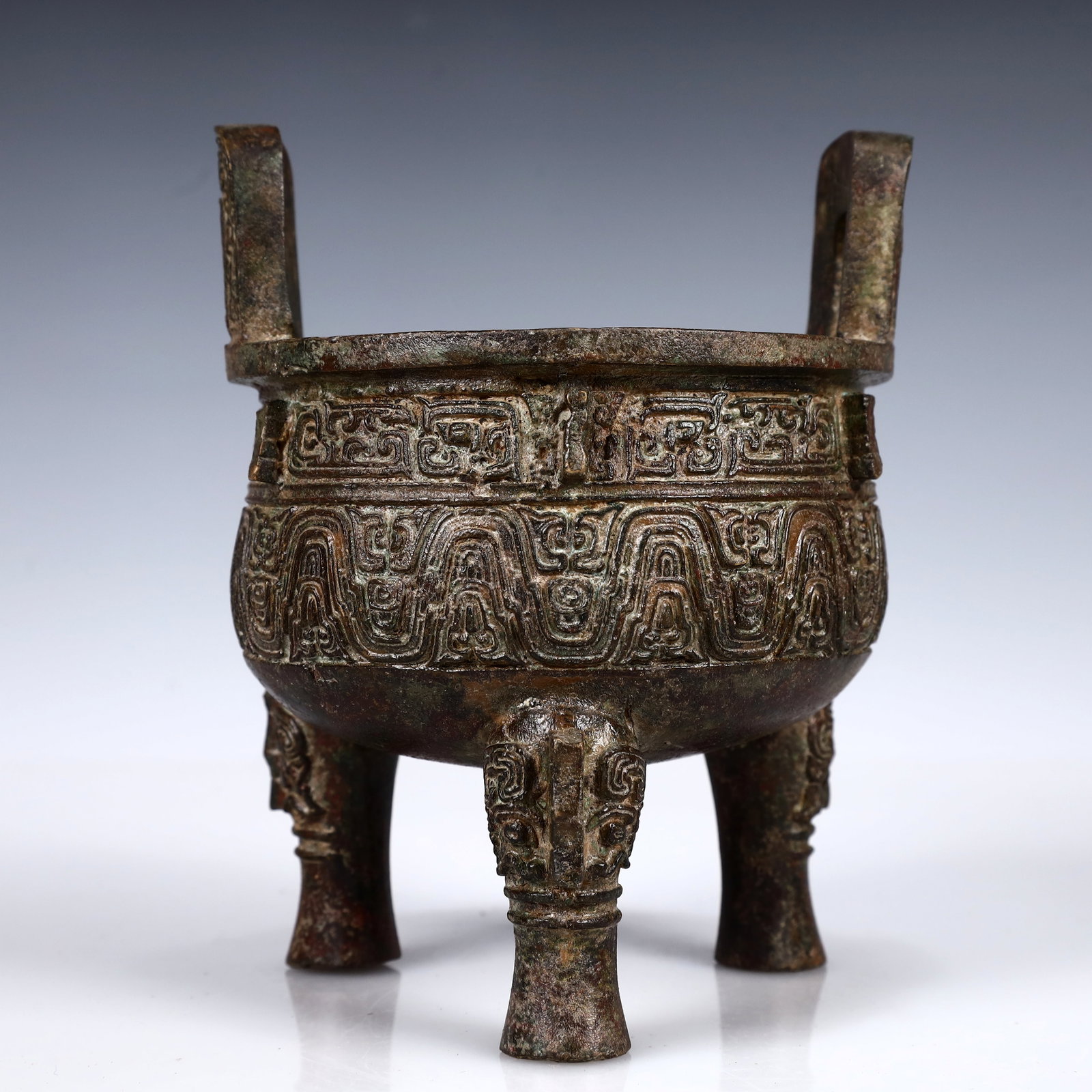 A Rare Bronze Double-Ears and Tripod Censer: A Rare Bronze Double-Ears and Tripod Censer,W.Zhou,China,Size:5.1inx5.1inx6.3in,Weight:1450g 青铜双耳三足香炉,中国西周时&#