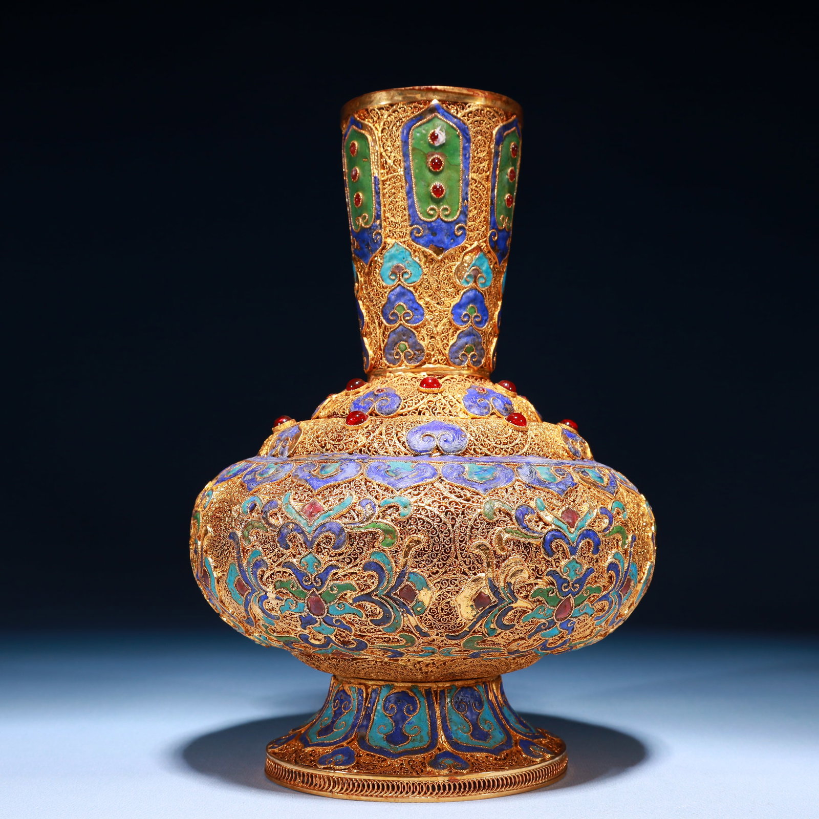 An Exquisite Filigree and Gilding Lotus Pattern Vase,Inlaid Gems: An Exquisite Filigree and Gilding Lotus Pattern Vase,Inlaid Gems,Qing Dynasty,China,Qianlong Four-character Mark,Size:6.7inx10.6in,Weight:1250g 掐丝鎏金缠枝莲
