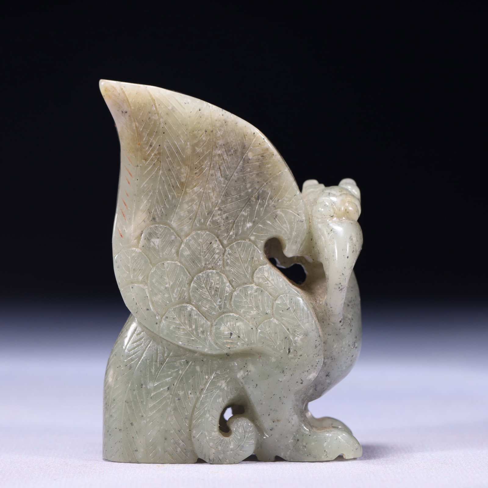 An Exquisite White Jade Phoenix Ornament: An Exquisite White Jade Phoenix Ornament,Qing Dynasty,China,Size:2.4inx1.2inx3.3in,Weight:262g 白玉凤摆件,中国清代