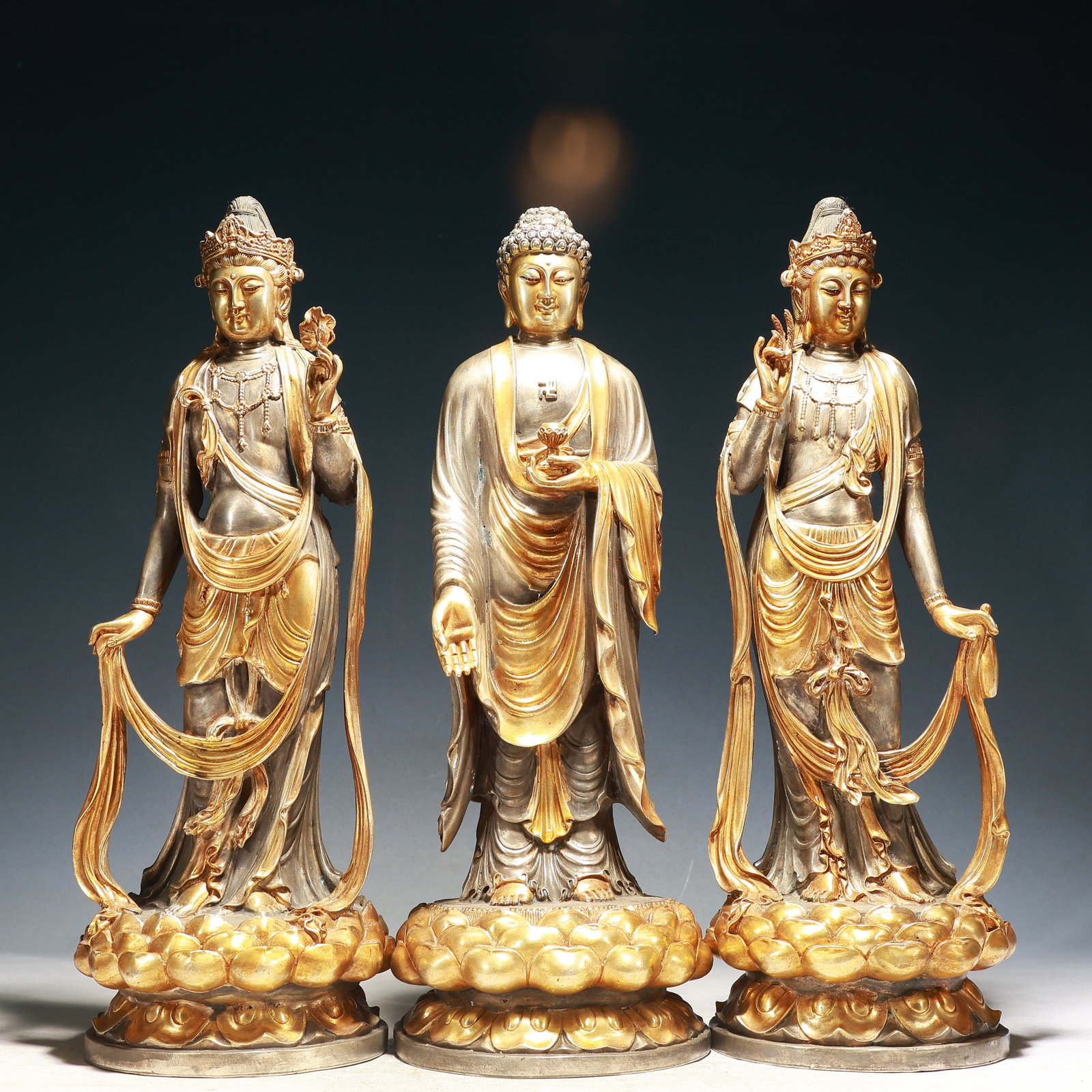 A Set of Solemn Silver-Gilt Bronze Buddha Statue: A Set of Solemn Silver-Gilt Bronze Buddha Statue,Ming Dynasty,China,Yongle Six-character Mark,Size:6.7inx18.1in,Weight:18050g 一套铜鎏金鎏银佛像,&