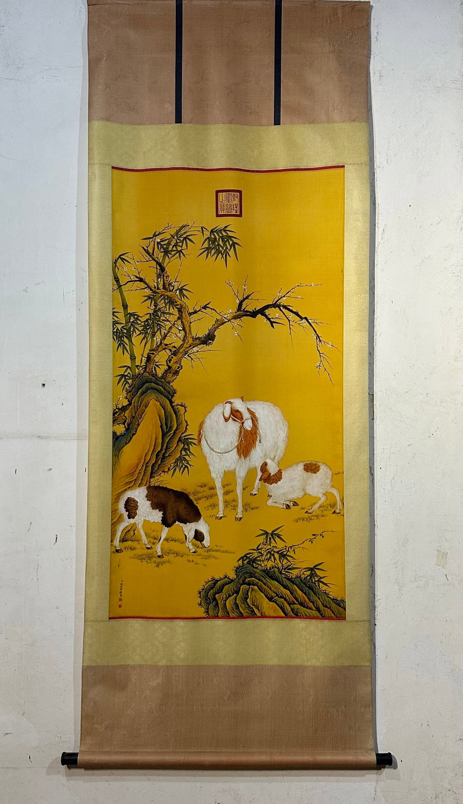 A Chinese Vertical Scroll Ink Painting of Sheep on Paper: A Chinese Vertical Scroll Ink Painting of Sheep on Paper,Lang Shining,Size:(entirety)86.6inx32.3in,(Without frame)51.2inx26.8in 一幅中国水墨羊画立