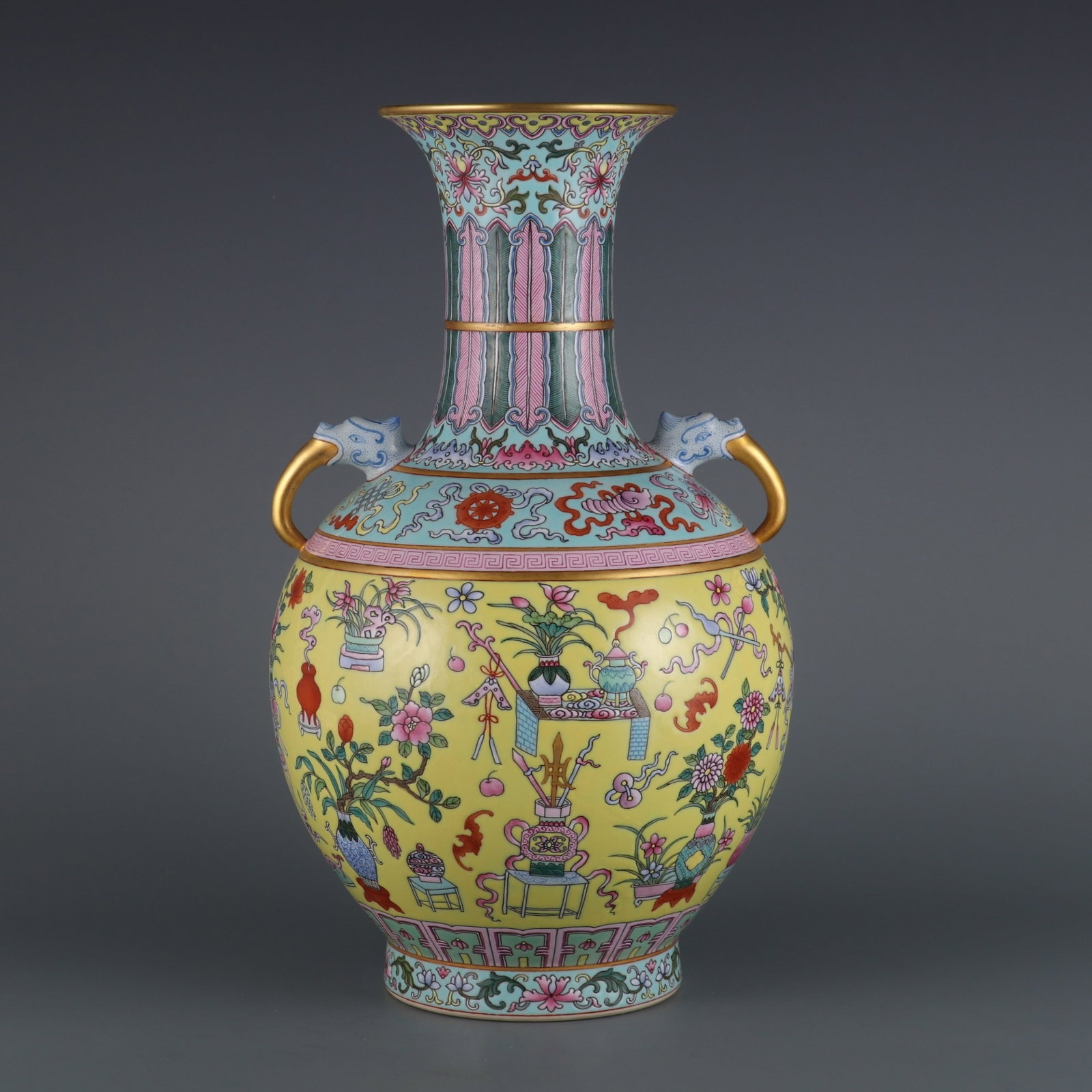 A Rare Yellow Ground Famille-Rose Painted Gold Flower Pattern Double-Ears Vase: A Rare Yellow Ground Famille-Rose Painted Gold Flower Pattern Double-Ears Vase,Qing Dynasty,China,Qianlong Six-character Mark,Size:13.8inx4.5in 黄地粉彩描金花