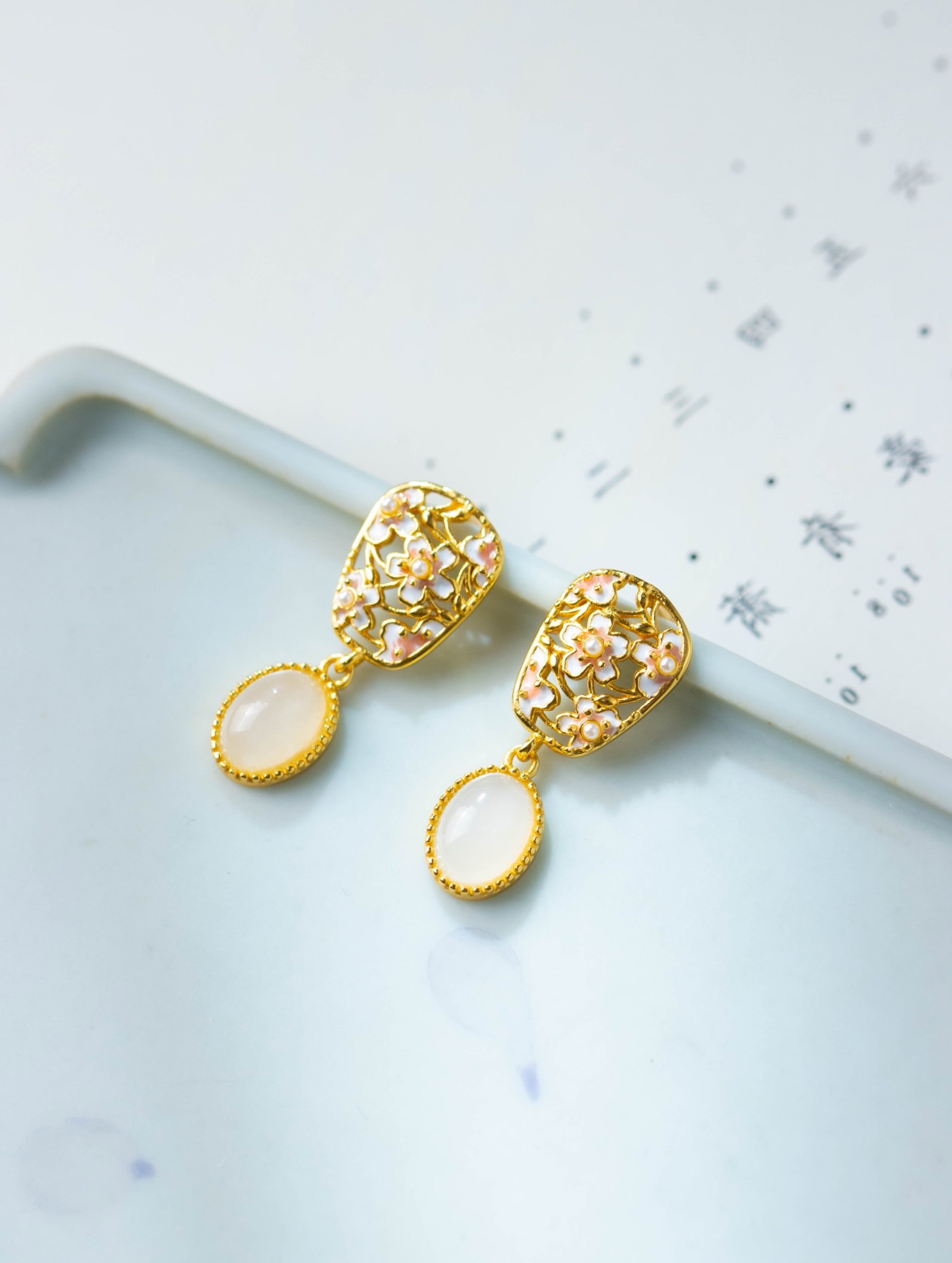 A Pair of Exquisite Sterling Silver-Gold Plated Inlaid White Jade Earrings: A Pair of Exquisite Sterling Silver-Gold Plated Inlaid White Jade Earrings 一对纯银镀金镶白玉耳环