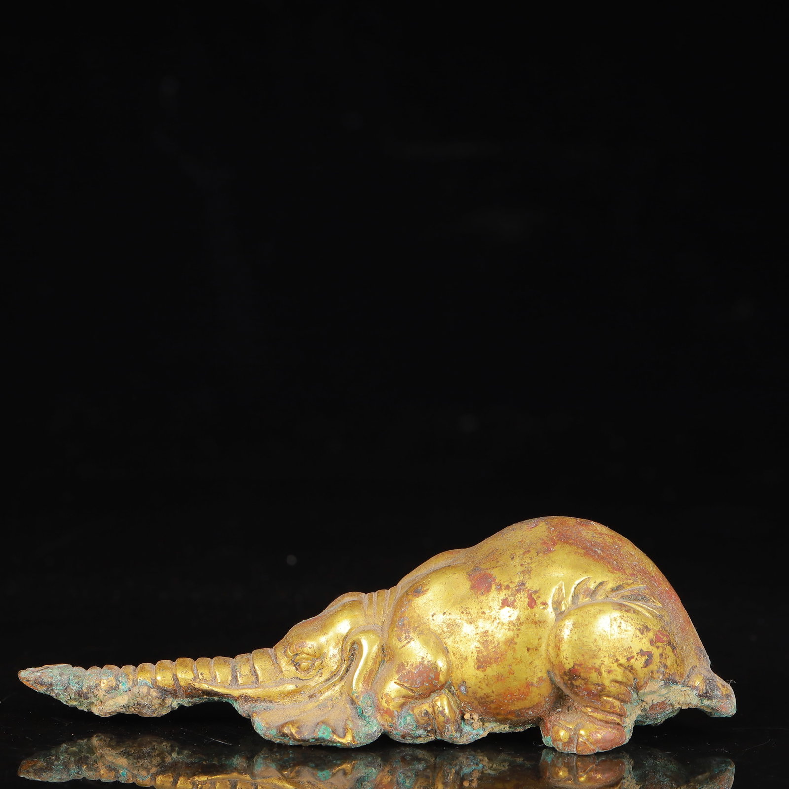 An Exquisite Gilt Bronze Elephant Ornament: An Exquisite Gilt Bronze Elephant Ornament,Qing Dynasty,China,Size:5.1inx1.6inx1.4in,Weight:505g 铜鎏金象摆件,中国清代