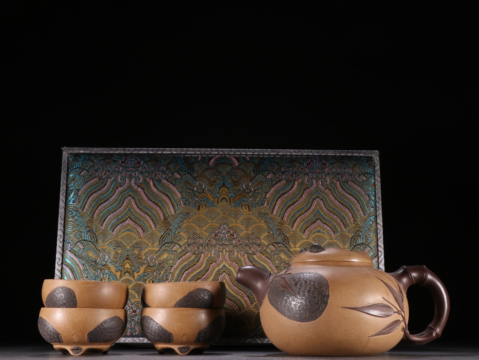 A Set of Rare Purple Sands Bamboo Pattern Teawares: A Set of Rare Purple Sands Bamboo Pattern Teawares,Qing Dynasty,China,Lv Yaochen Mark,Size:(Teapot)3.7inx6.9in,(Cup)1inx2.7in 一套紫砂竹纹茶具,中&