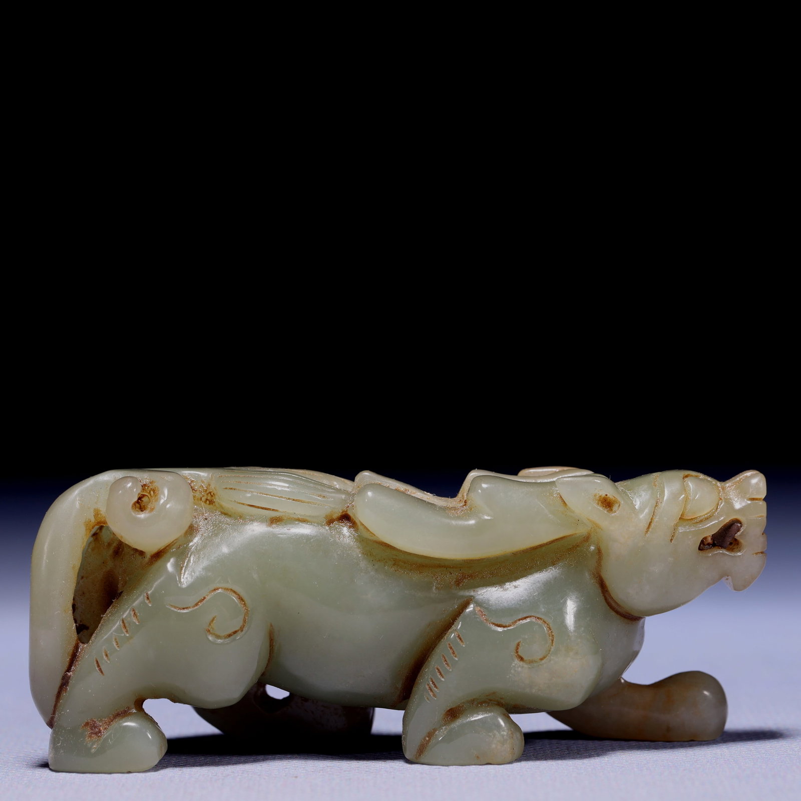 An Exquisite White Jade Beast Ornament: An Exquisite White Jade Beast Ornament,Qing Dynasty,China,Size:3.5inx1.2inx1.4in,Weight:147g 白玉兽摆件,中国清代