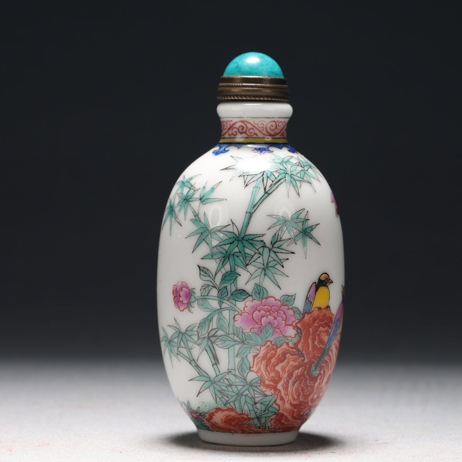 A Fine Enamel Flower and Bird Pattern Porcelain Snuff Bottle: A Fine Enamel Flower and Bird Pattern Porcelain Snuff Bottle, Qing Dynasty, China, Qianlong Four-character Mark, Size:1.6inx3.3in 瓷胎画珐琅彩花鸟ಬ