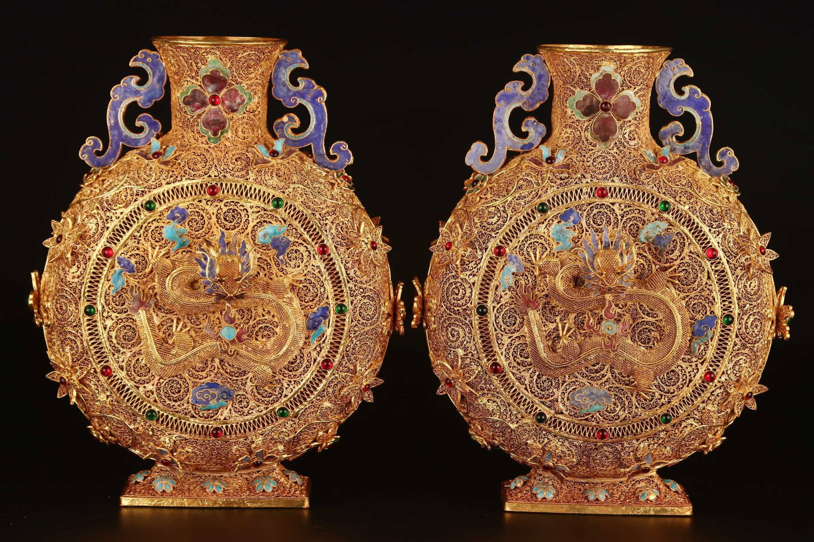 A Pair of Exquisite Filigree and Gilding Auspicious Cloud and Dragon Pattern Double-Ears: A Pair of Exquisite Filigree and Gilding Auspicious Cloud and Dragon Pattern Double-Ears Vases,Inlaid Gems,Qing Dynasty,China,Qianlong Four-character Mark,Size:10.6inx8.3in,Total Weight:2400g 一