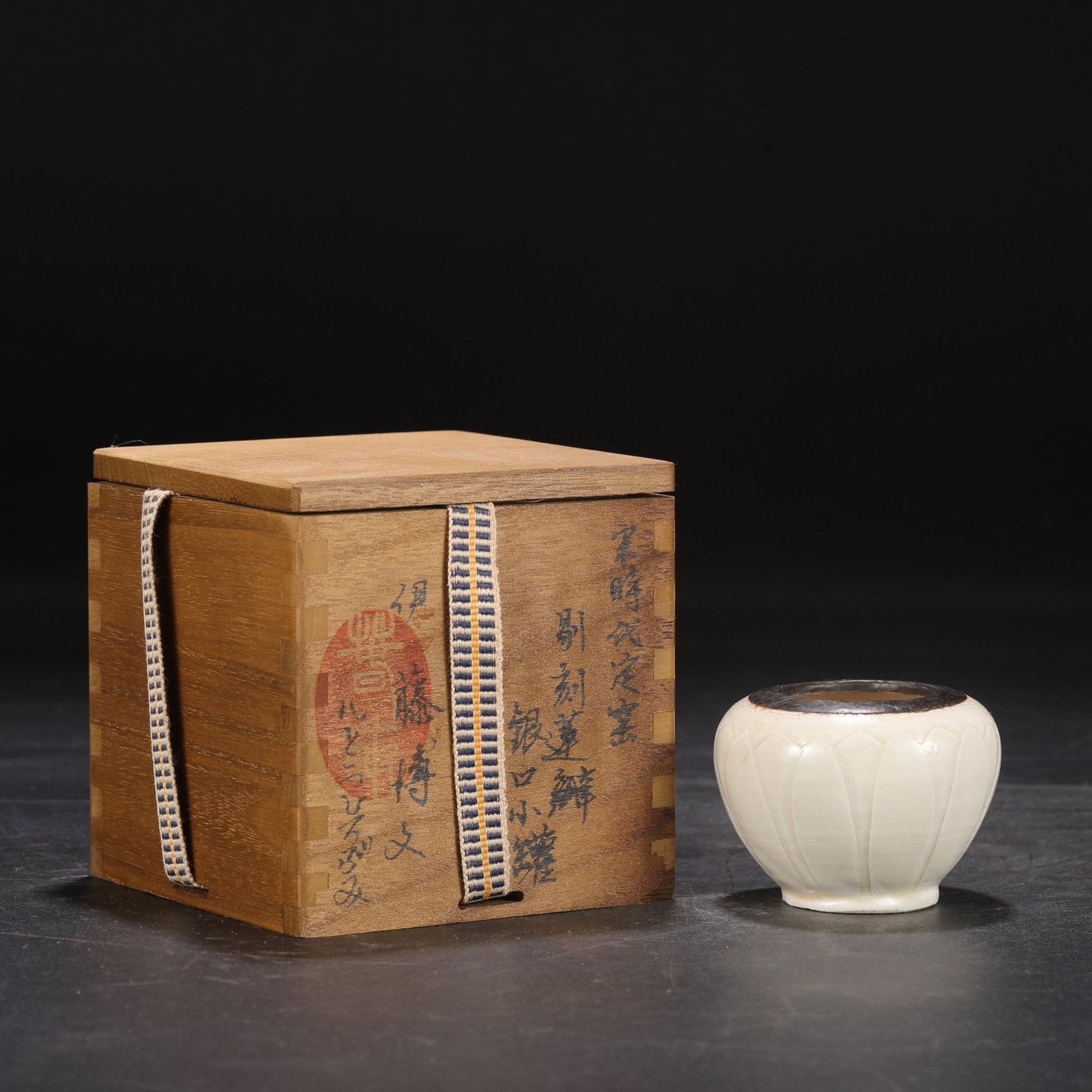 An Exquisite Ding yao White Glazed Flower Pattern Cover with Silver Jar (1 of 7)