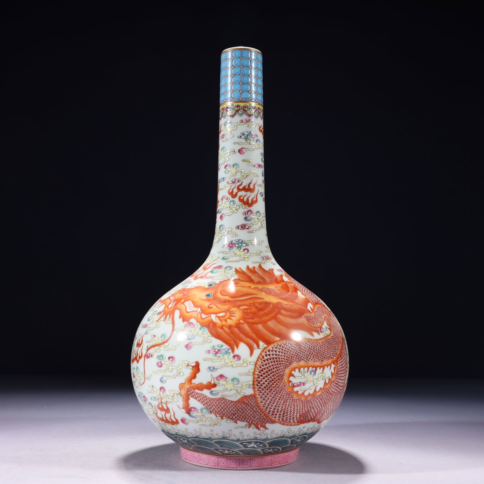 An Exquisite Iron-Red Painted Gold Auspicious Cloud and Dragon Pattern Vase: An Exquisite Iron-Red Painted Gold Auspicious Cloud and Dragon Pattern Vase,Qing Dynasty,China,Yongzheng Six-character Mark,Size:6.3inx13.8in,Weight:1400g