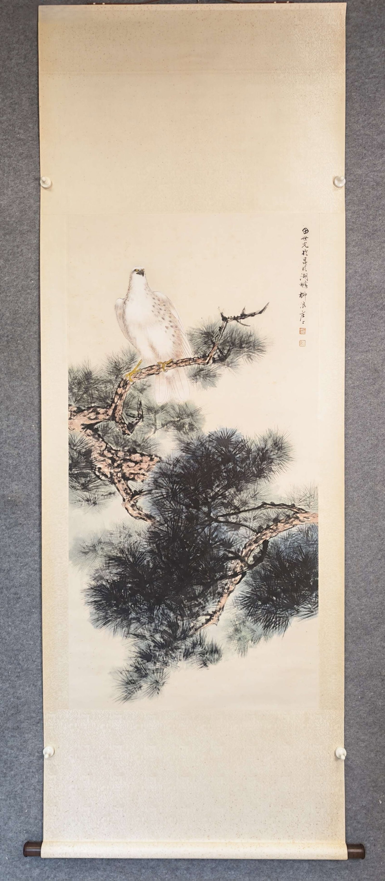A Chinese Vertical Scroll Ink Painting of Pine and Eagle on Paper: A Chinese Vertical Scroll Ink Painting of Pine and Eagle on Paper,Tian Shiguang,Size:26.8inx53.9in 一幅中国水墨松鹰画立轴,田