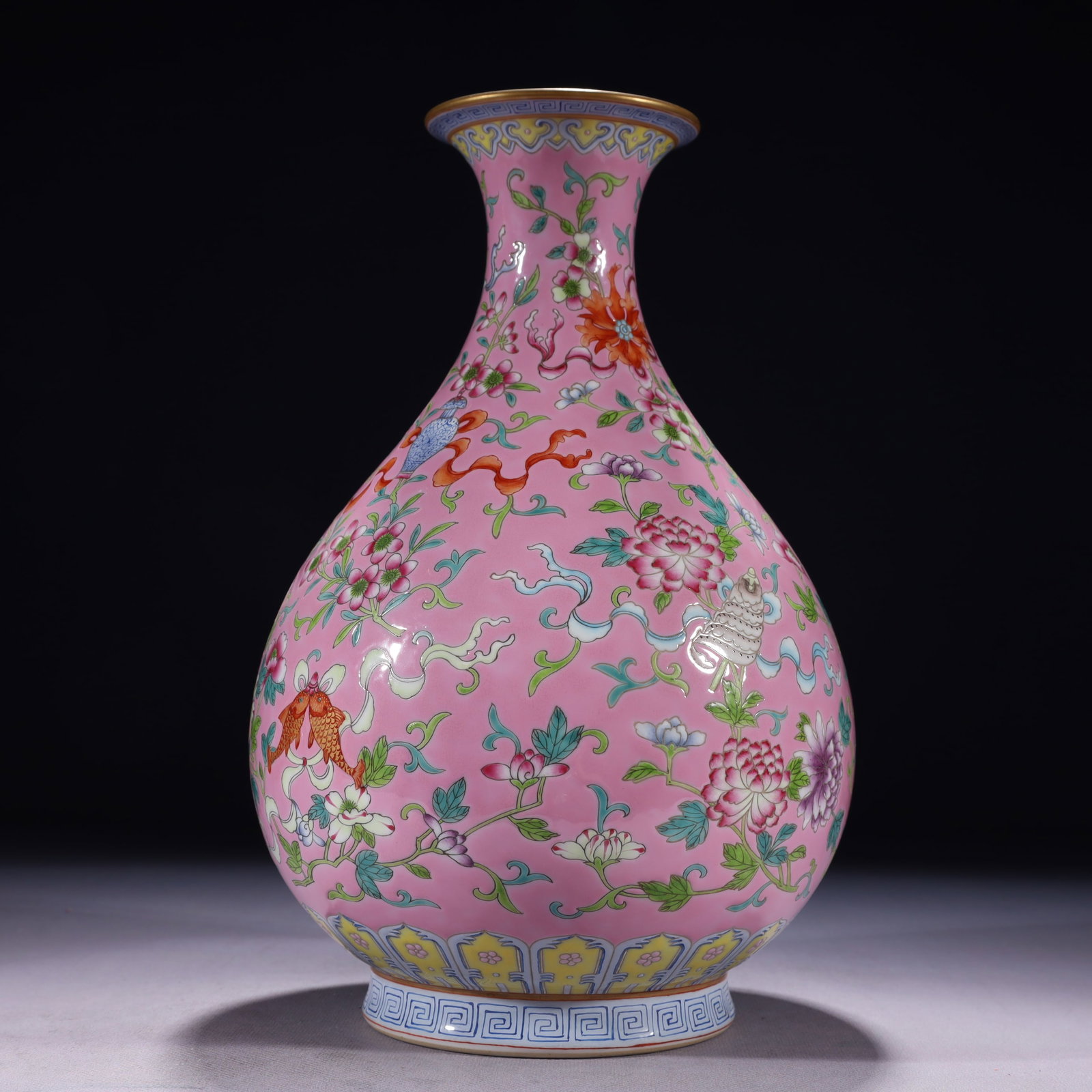 An Exquisite Famille-Rose Painted Gold Lotus and Eight Treasures Pattern Vase: An Exquisite Famille-Rose Painted Gold Lotus and Eight Treasures Pattern Vase,Qing Dynasty,China,Qianlong Six-character Mark,Size:6.7inx11.8in,Weight:2000g 粉彩描金缠