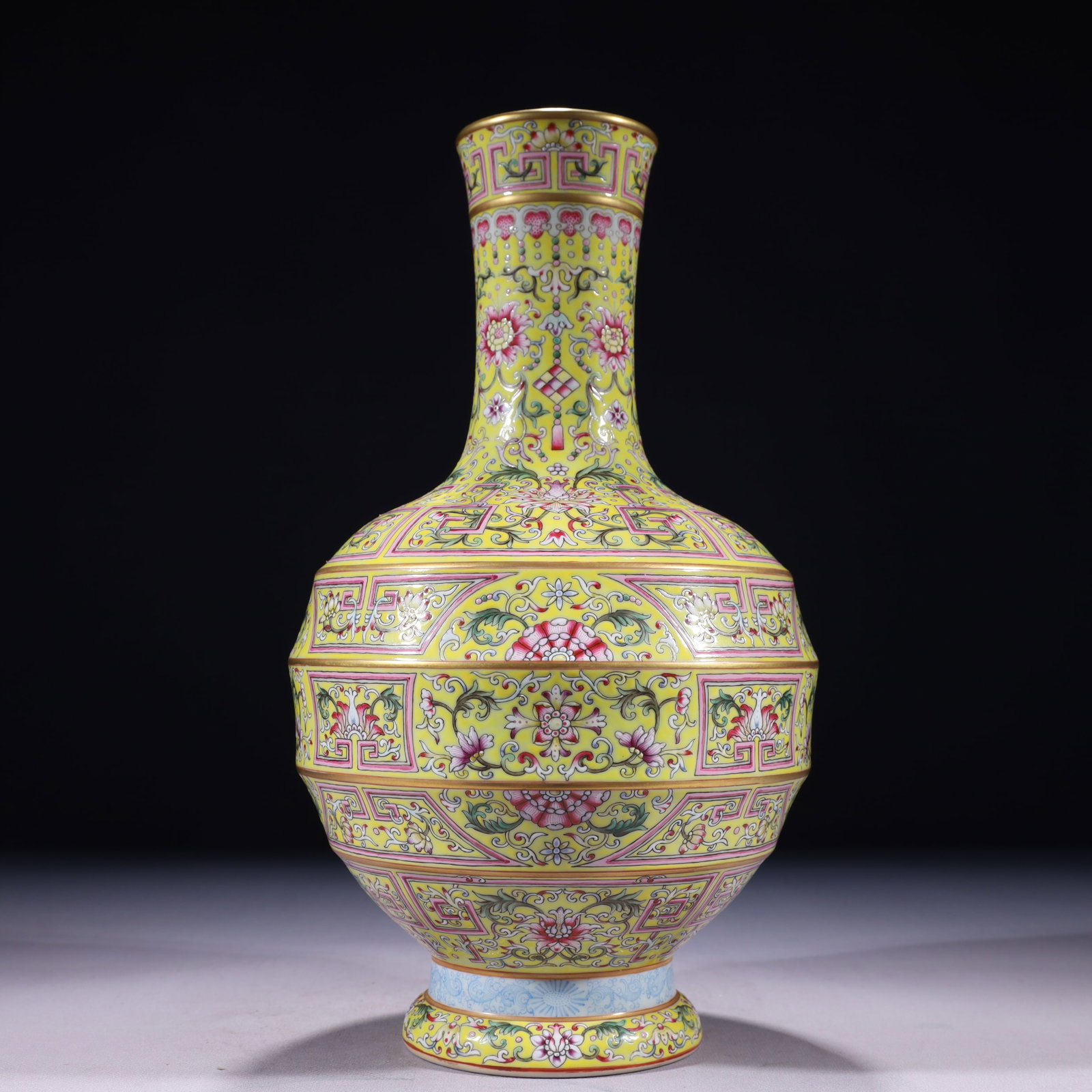 An Exquisite Yellow Ground Famille-Rose Painted Gold Lotus Pattern Vase: An Exquisite Yellow Ground Famille-Rose Painted Gold Lotus Pattern Vase 黄地粉彩描金缠枝莲纹瓶,中国清代,ߙ