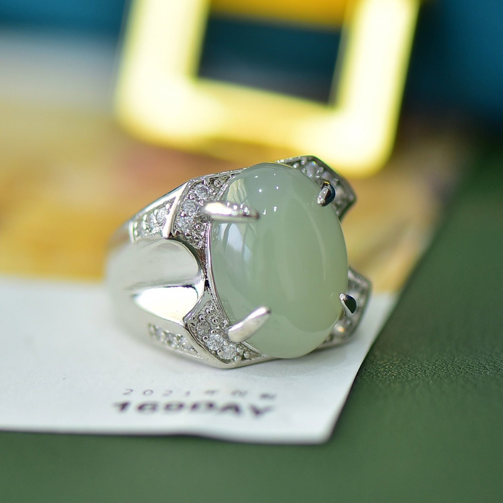 An Exquisite Bronze Inlaid White Jade Ring: An Exquisite Bronze Inlaid White Jade Ring,Size:5.1inx7.1in 铜镶白玉戒指