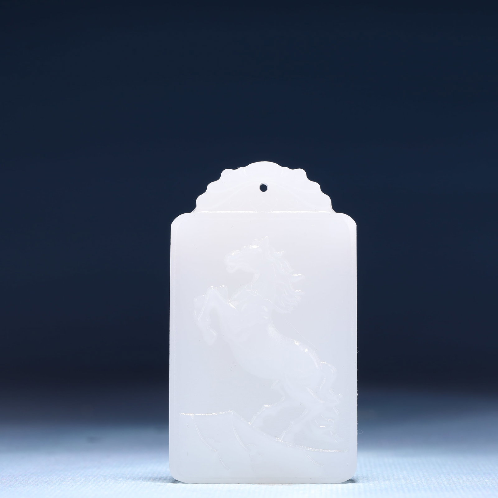 An Exquisite White Jade Horse Pattern Pendant: An Exquisite White Jade Horse Pattern Pendant,Size:1.6inx0.4inx2.4in,Weight:46g 白玉骏马纹牌