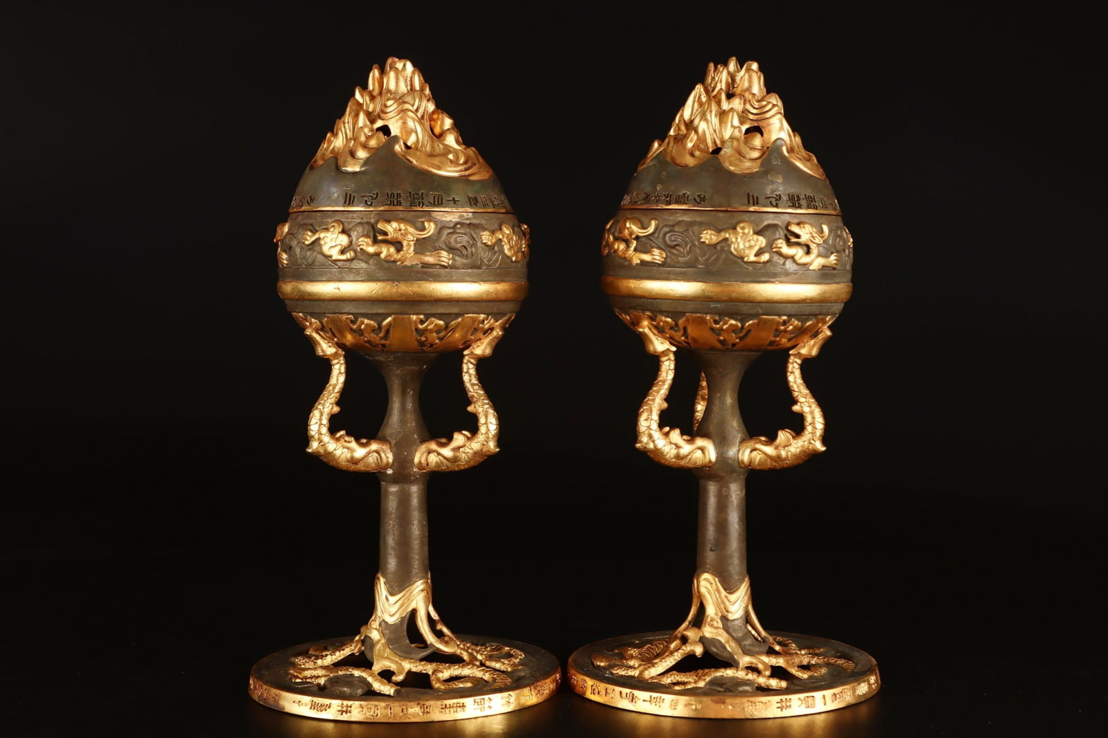 A Pair of Exquisite Gilt Bronze Dragon Pattern Tripod Censer,With Inscriptions: A Pair of Exquisite Gilt Bronze Dragon Pattern Tripod Censer,With Inscriptions,Qing Dynasty,China,Size:10.6inx4.9in,Total Weight:2463g 一对铜鎏金龙纹三&