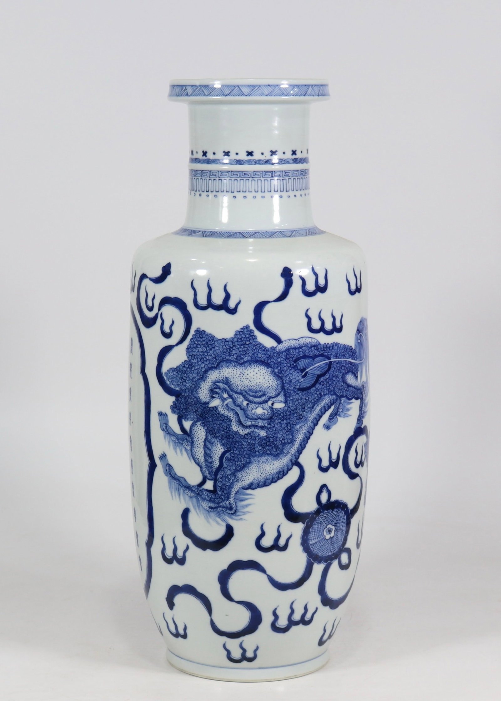 A fine blue and white club-shaped vase with lion playing ball pattern and poetic inscription: A fine blue and white club-shaped vase with lion playing ball pattern and poetic inscription, Qing Dynasty, China, Size:19inx7.1in 青花狮子戏球诗文Č