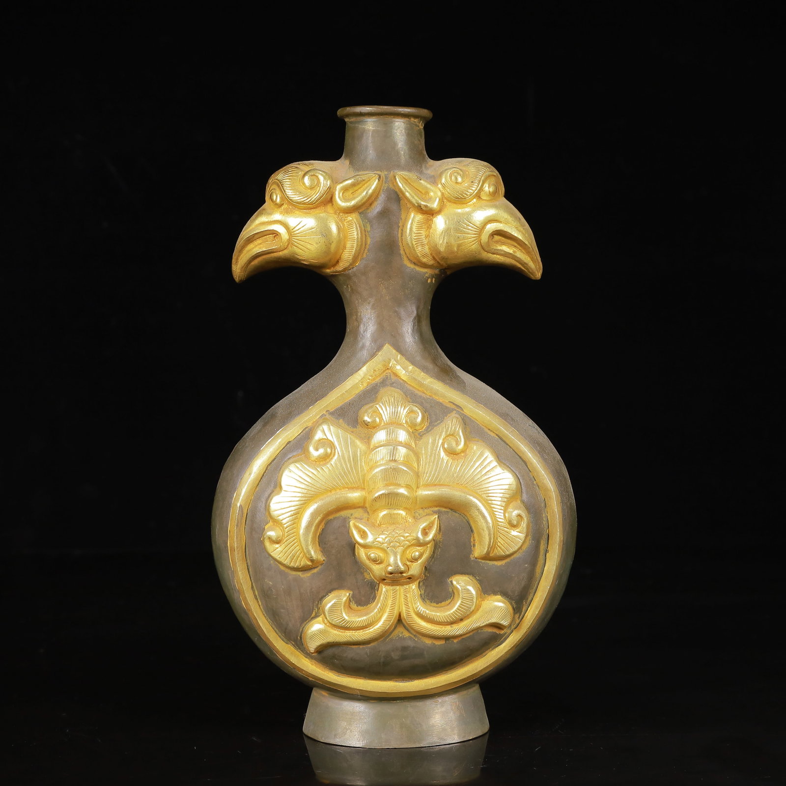 An Exquisite Gilt Silver Beast-Face Pattern Phoenix-Ears Vase: An Exquisite Gilt Silver Beast-Face Pattern Phoenix-Ears Vase,Tang Dynasty,China,Zhenguan Four-Character Mark,Size:4.7inx3.1inx8.7in,Weight:400g 银鎏金兽面纹凤