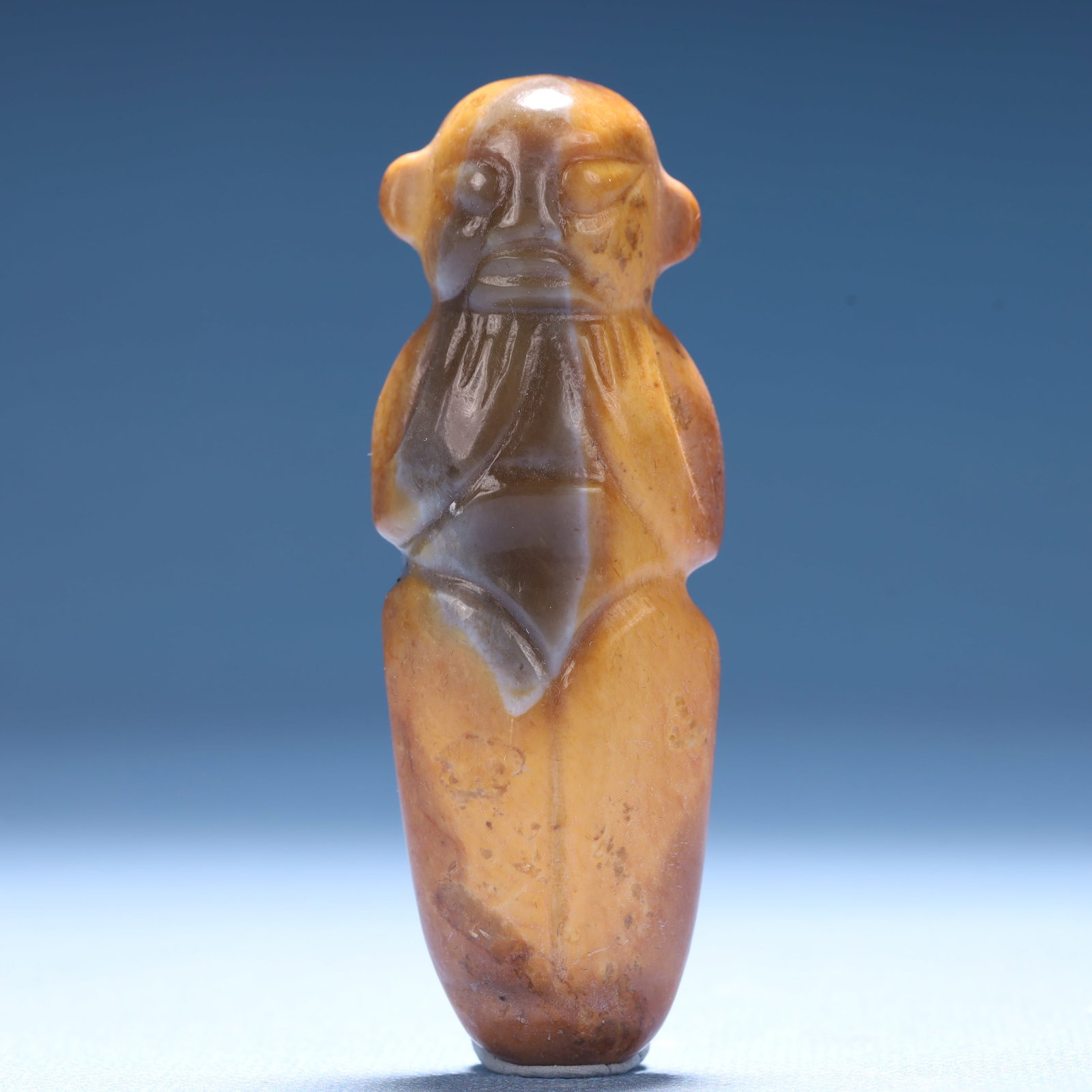 An Archaic Hongshan Culture Yellow Jade Figure Ornament: An Archaic Hongshan Culture Yellow Jade Figure Ornament,Ancient Time,China,Size:1.1inx0.8inx3in,Weight:60.5g 红山文化黄玉人物摆件,中&#