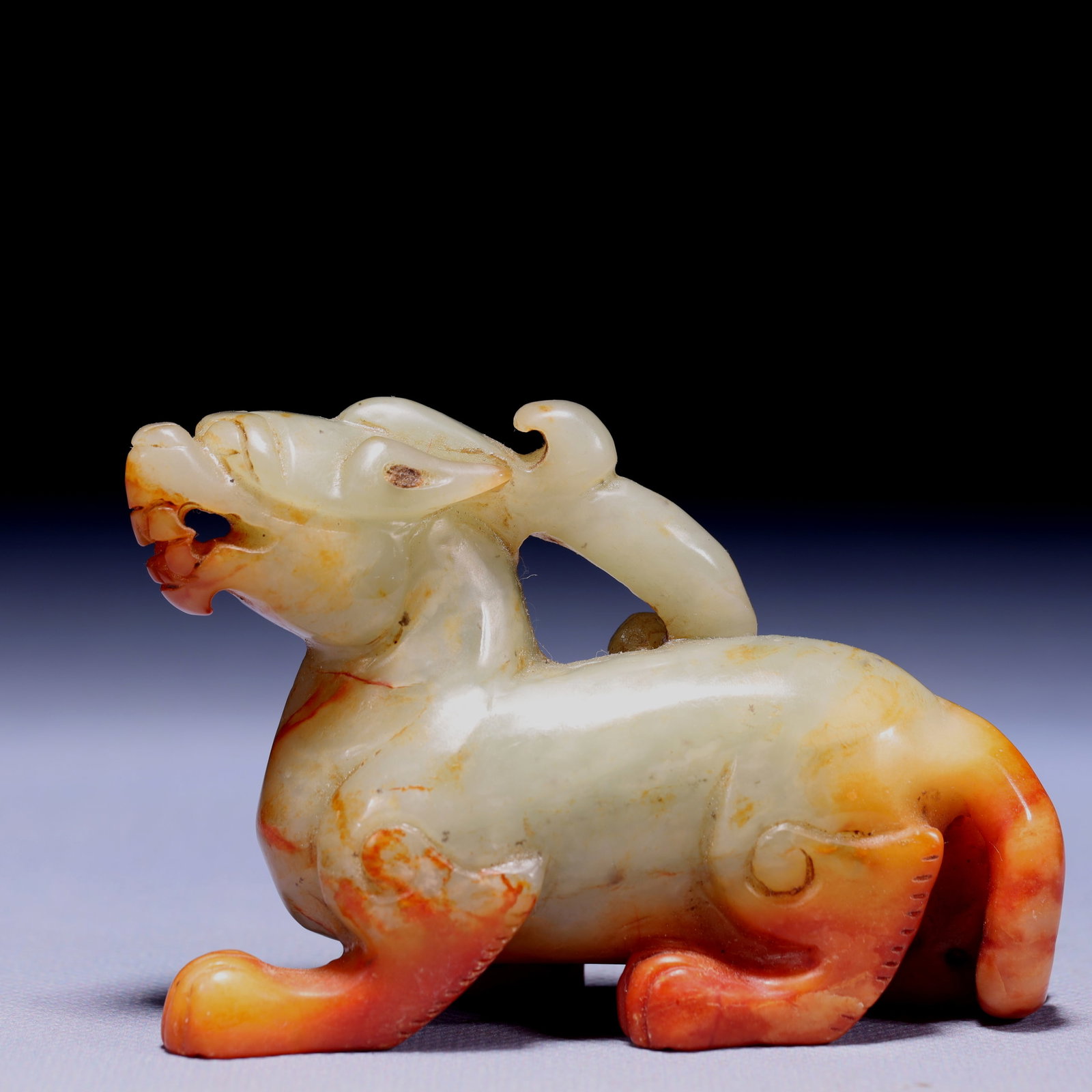 An Exquisite White Jade Unicorn Ornament: An Exquisite White Jade Unicorn Ornament,Qing Dynasty,China,Size:3.9inx1.6inx2.4in,Weight:237g 白玉独角兽摆件,中国清代