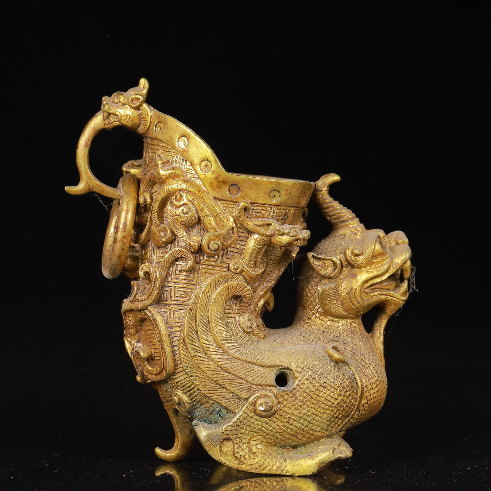 An Exquisite Gilt Bronze Unicorn Cup: An Exquisite Gilt Bronze Unicorn Cup,Qing Dynasty,China,Size:4.3inx2.4inx4.7in,Weight:841g 铜鎏金独角兽杯,中国清代